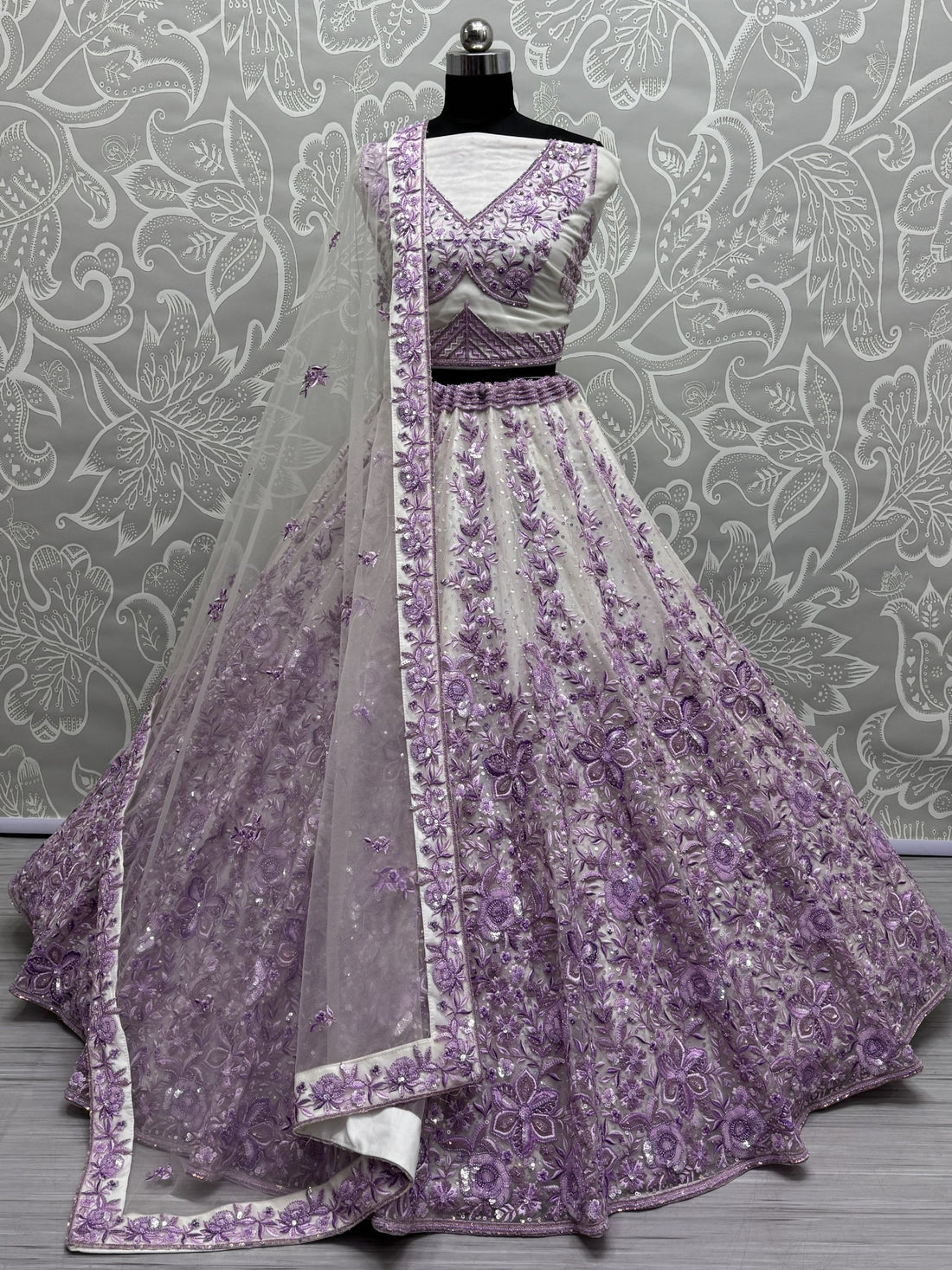 Beautiful Purple Multi Thread Work Net Wedding Lehenga Choli