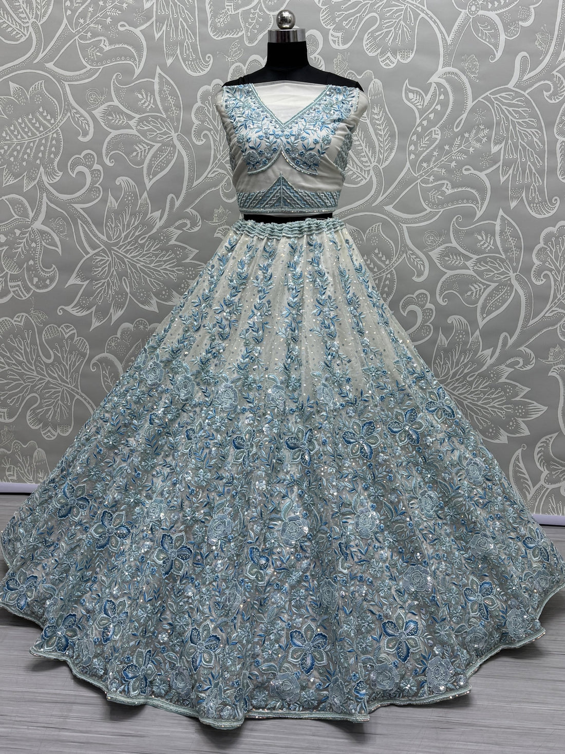 Enchanting Blue Multi Thread Work Net Bridesmaid Lehenga Choli With Dupatta