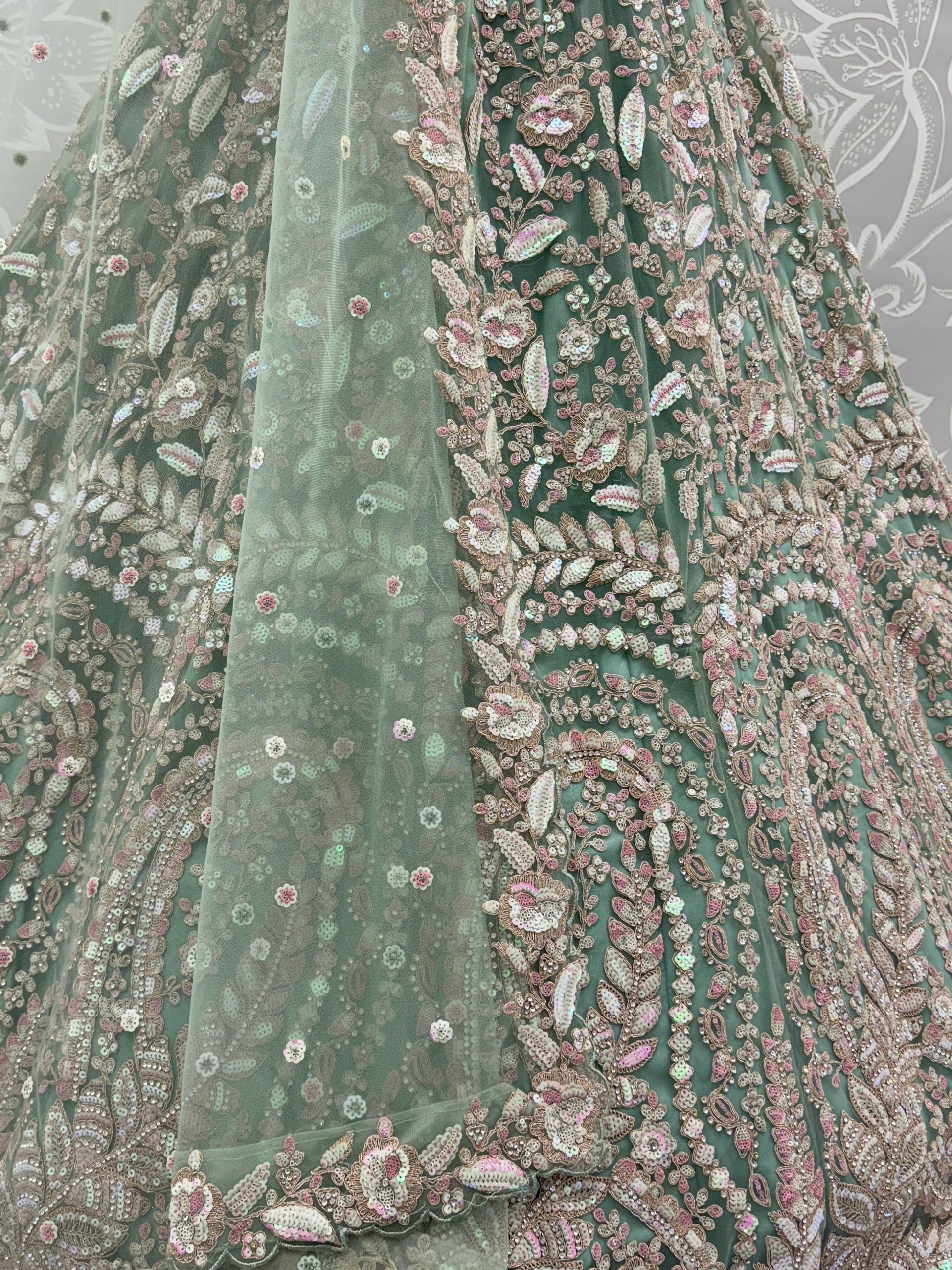 Enchanting Pista Green Sequins Net Reception Wear Lehenga Choli With Dupatta