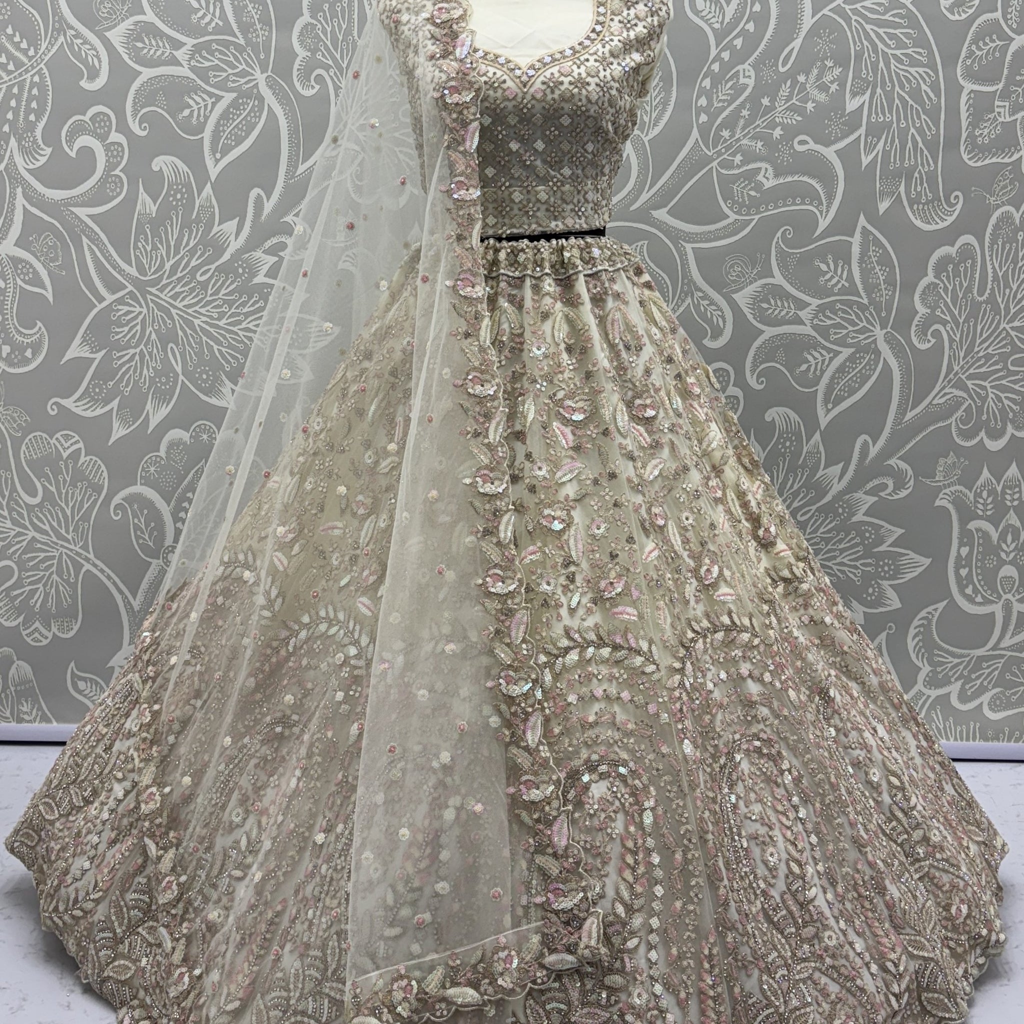 Charming Cream Zircon Work Net Bridesmaid Lehenga Choli With Dupatta