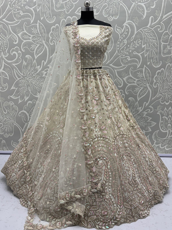 Charming Cream Zircon Work Net Bridesmaid Lehenga Choli With Dupatta