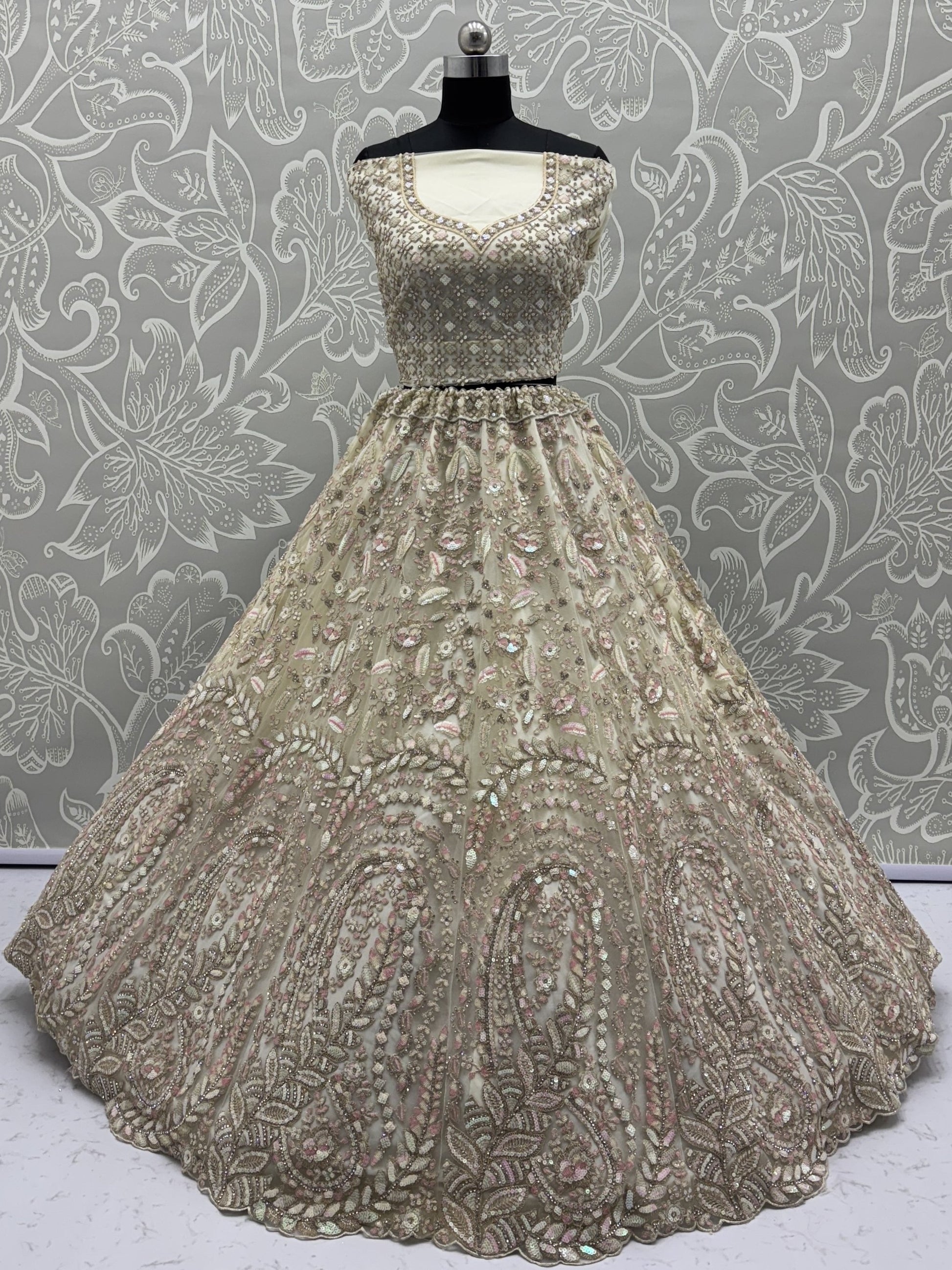 Charming Cream Zircon Work Net Bridesmaid Lehenga Choli With Dupatta