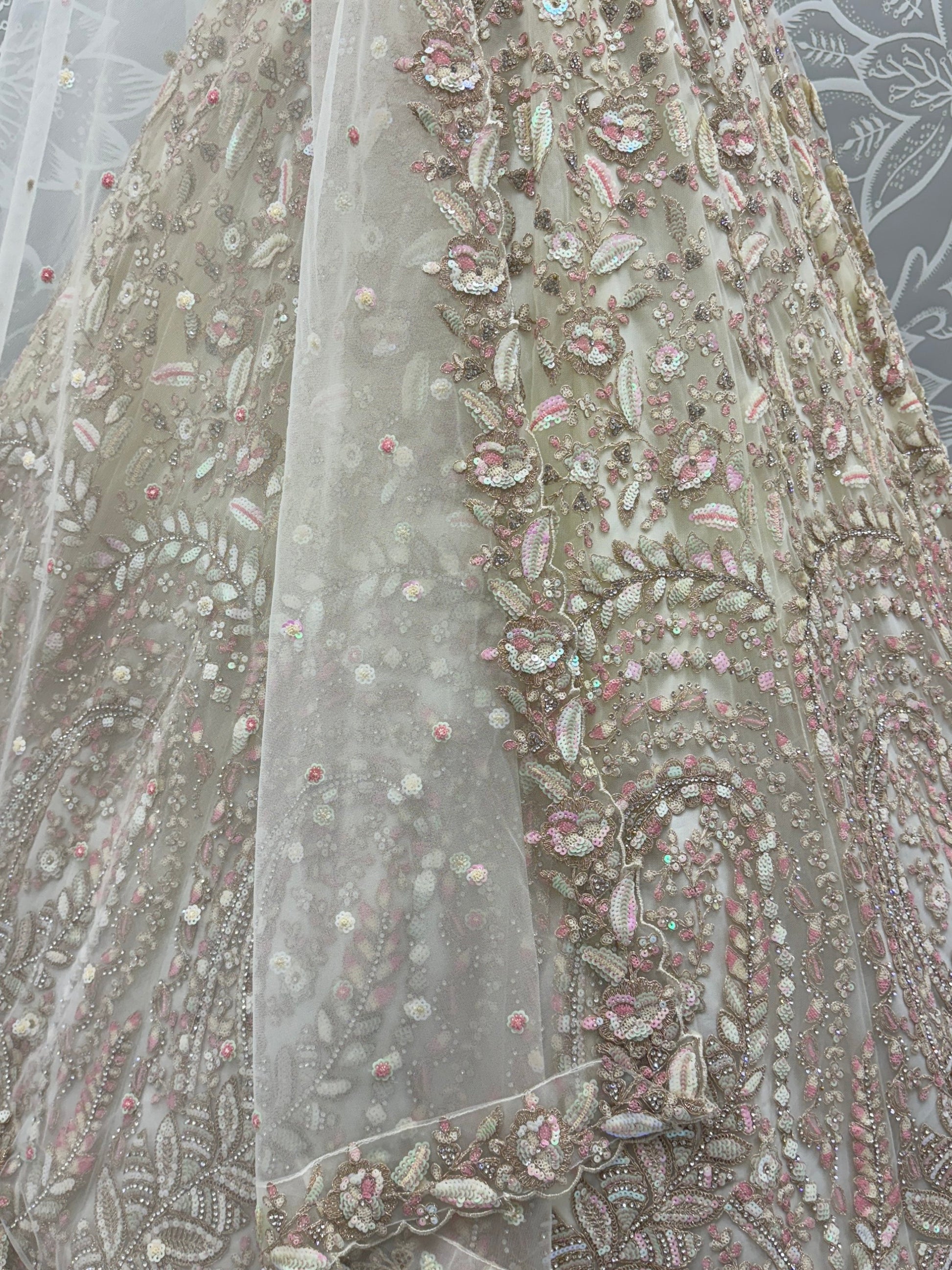 Charming Cream Zircon Work Net Bridesmaid Lehenga Choli With Dupatta
