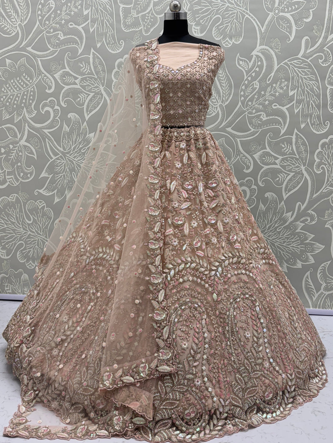 Excellent Peach Zircon Work Net Wedding Wear Lehenga Choli With Dupatta
