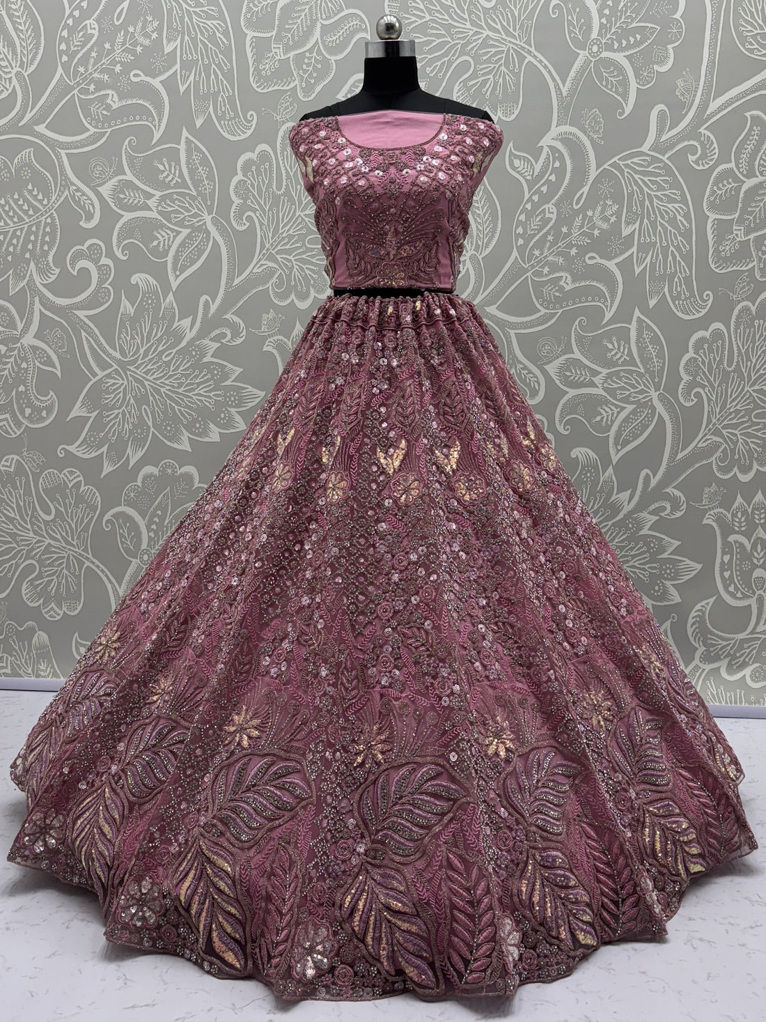 Dazzling Pink Multi Thread Embroidery Net Reception Wear Lehenga Choli