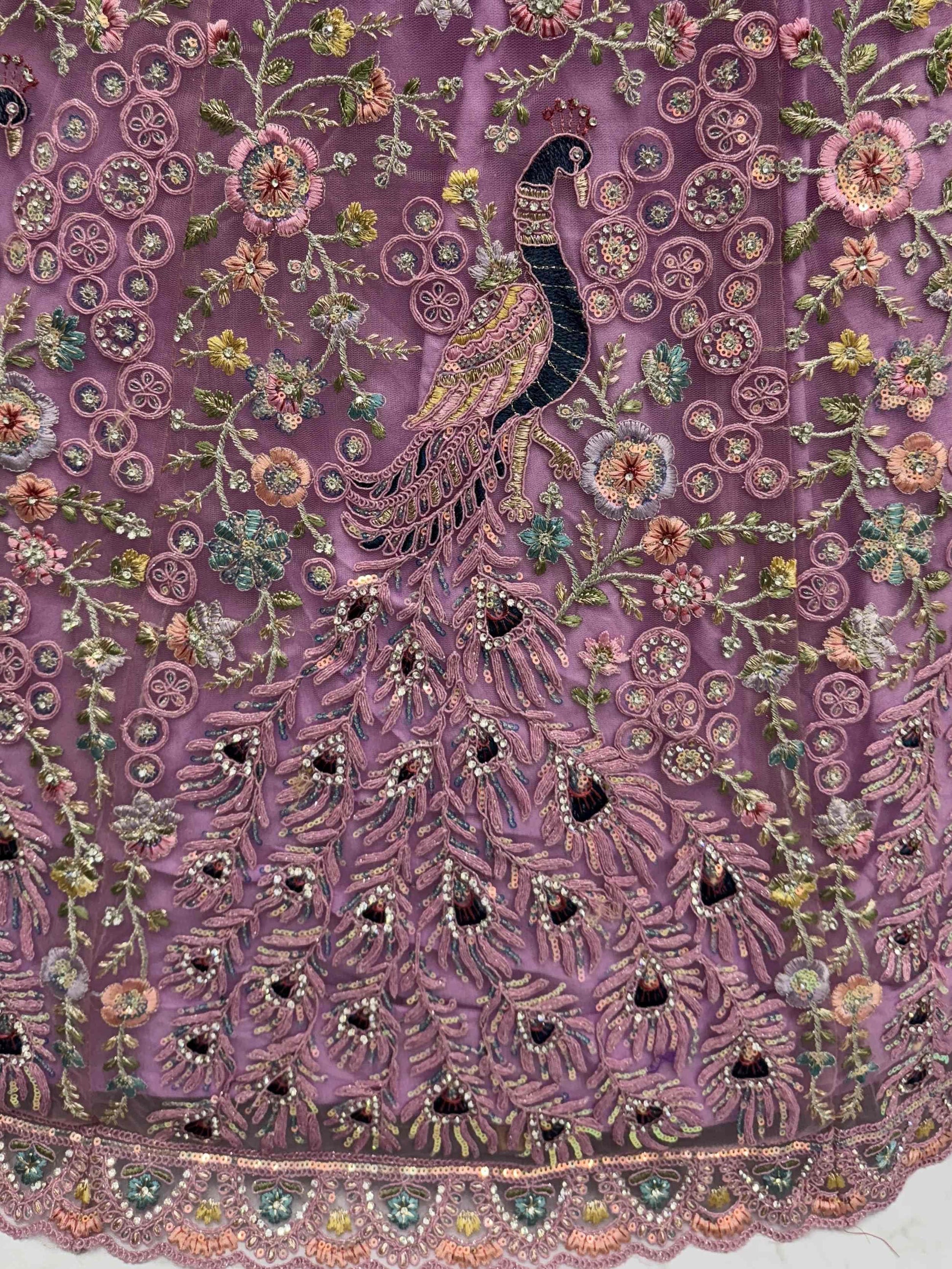 Astonishing Purple Zari Embroidered Net Engagement Wear Lehenga Choli