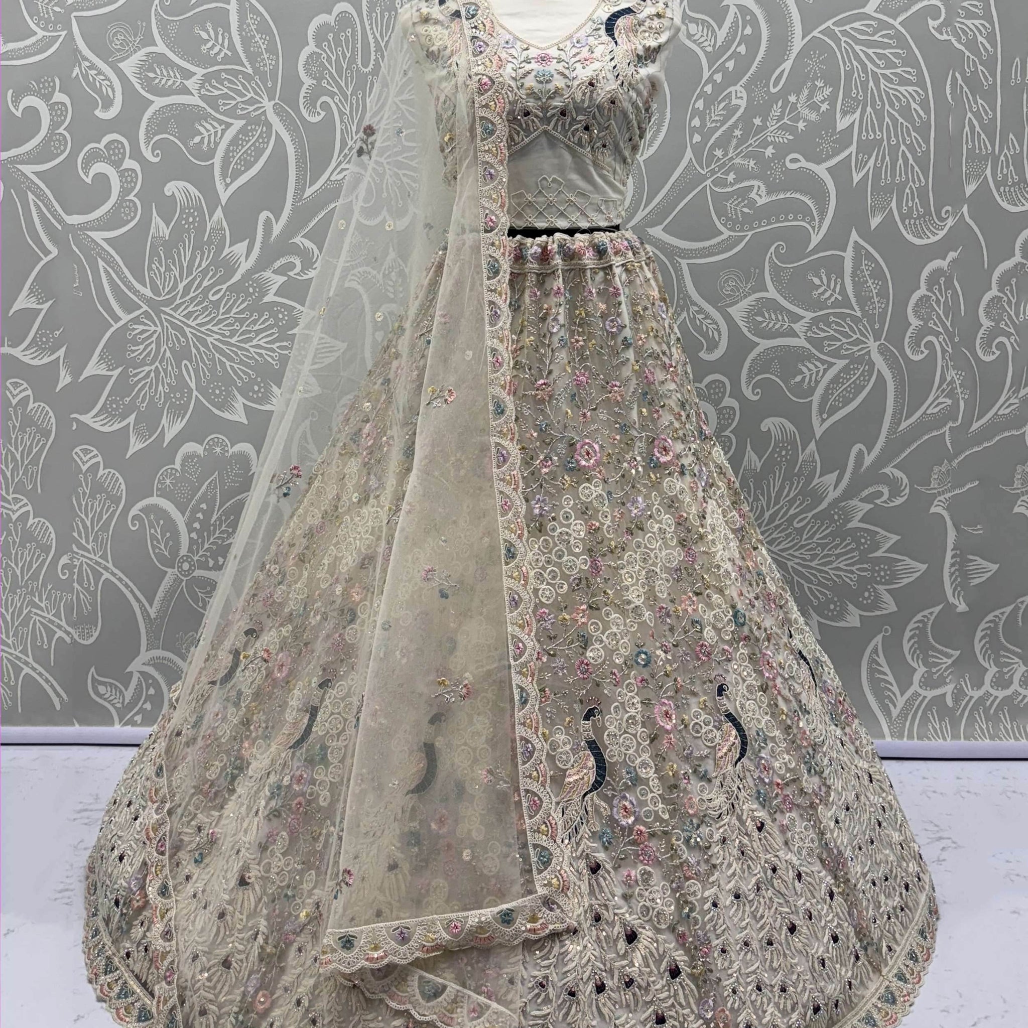 Stupendous White Thread Work Net Reception Wear Lehenga Choli With Dupatta