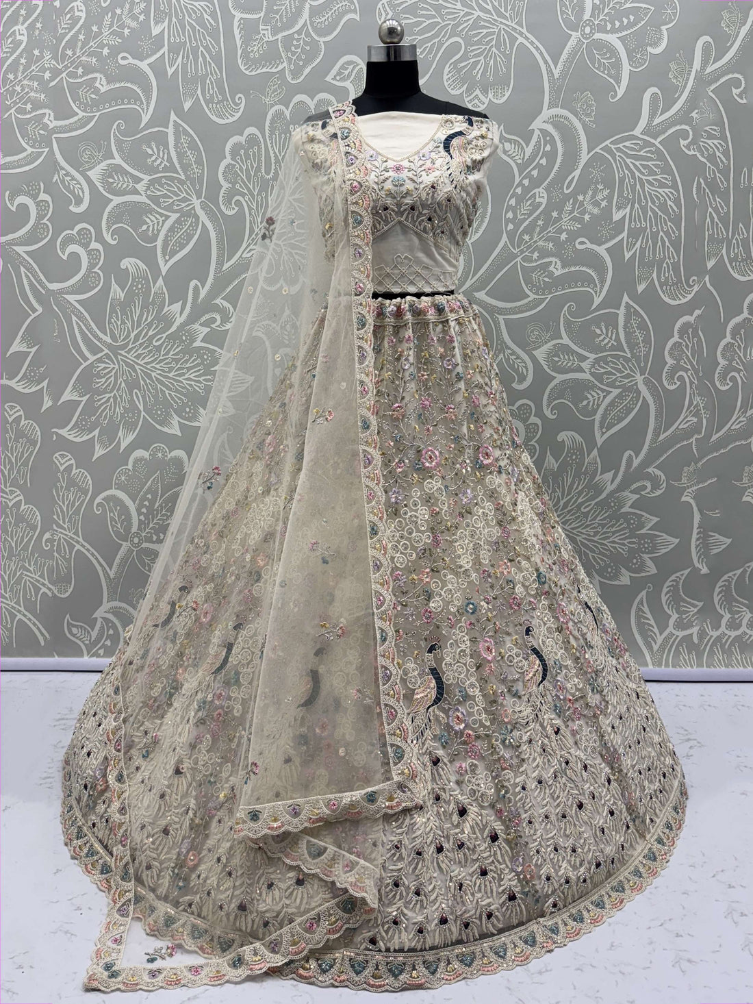 Stupendous White Thread Work Net Reception Wear Lehenga Choli With Dupatta