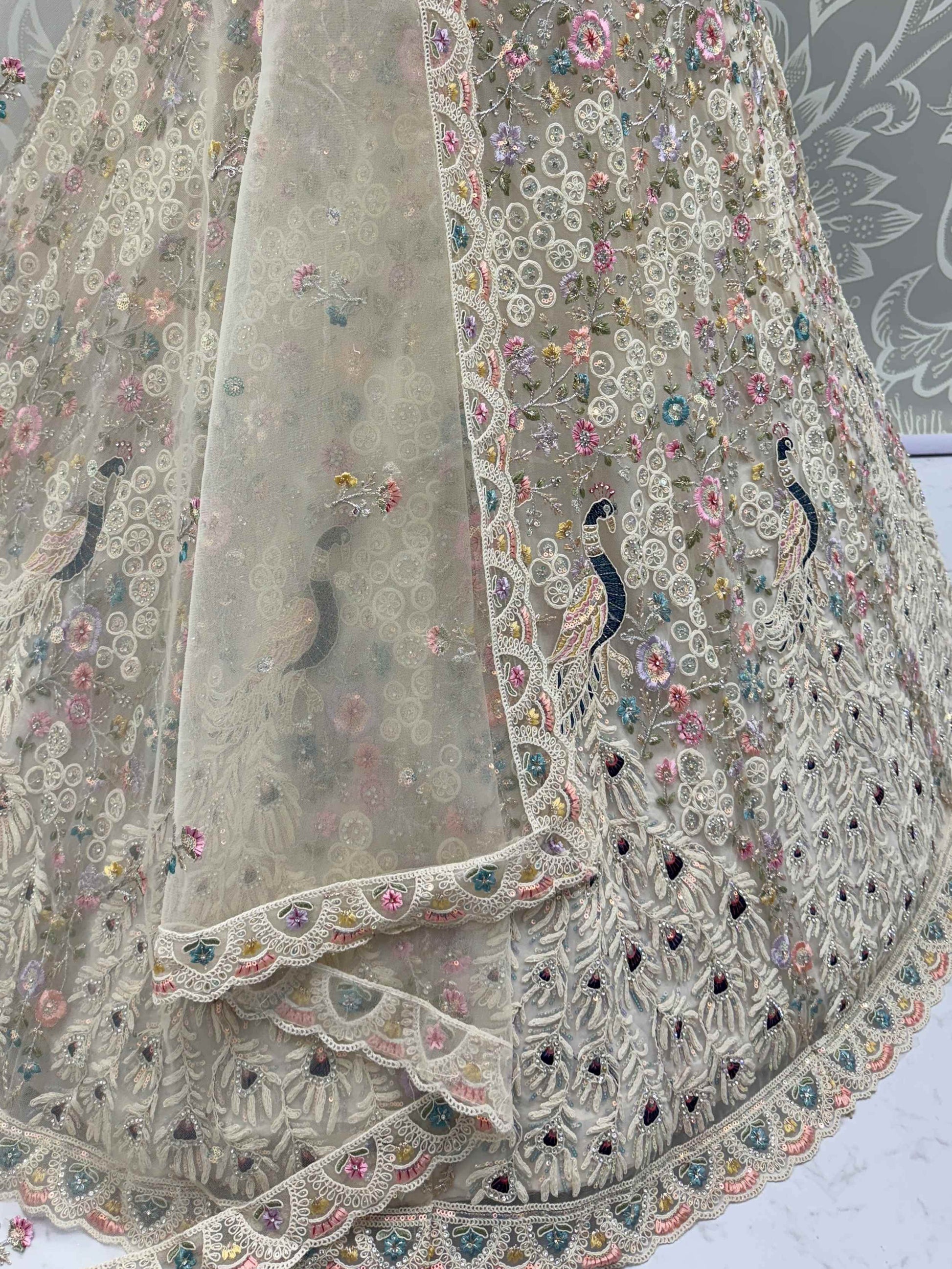 Stupendous White Thread Work Net Reception Wear Lehenga Choli With Dupatta