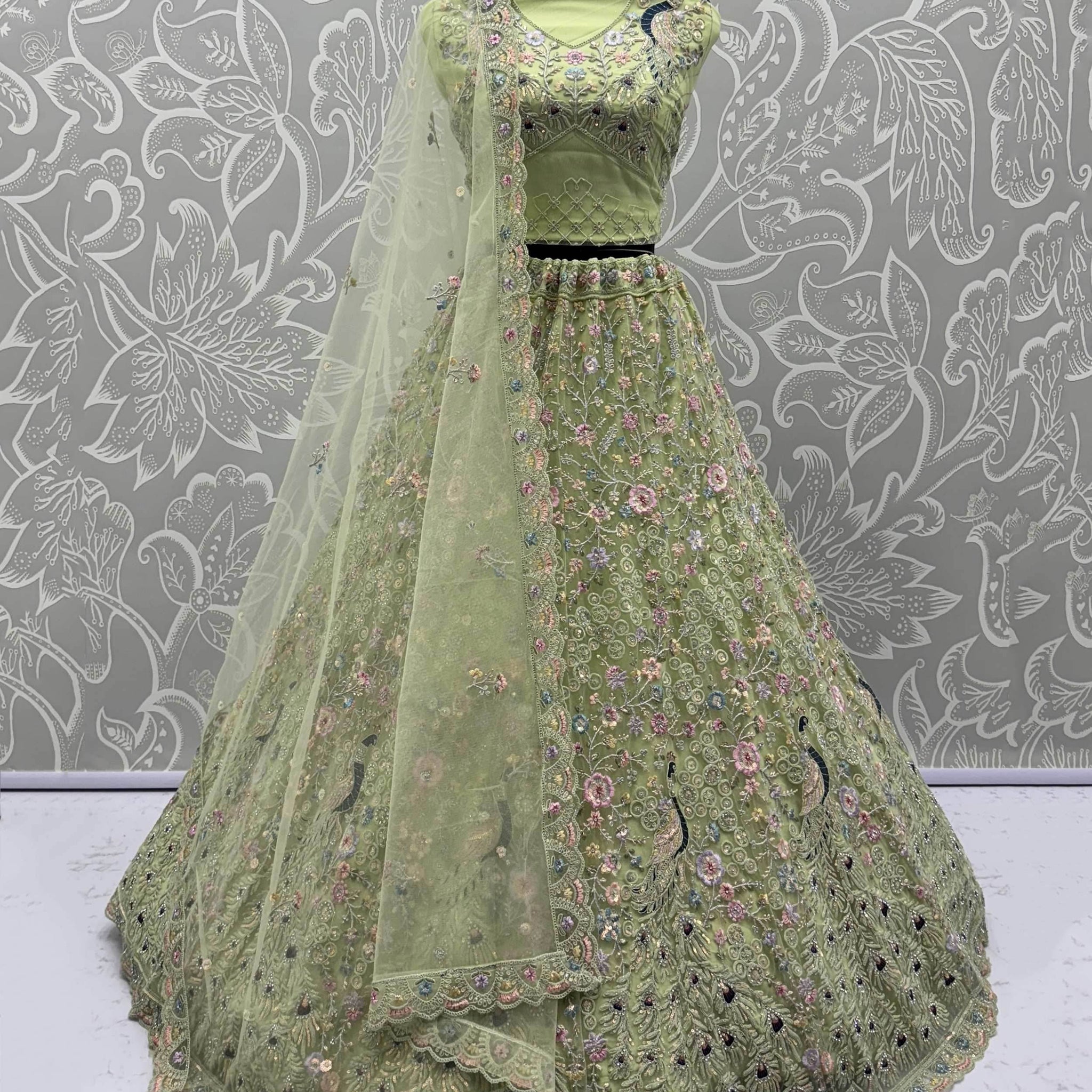 Pretty Green Zircon Work Net Sangeet Wear Lehenga Choli With Dupatta