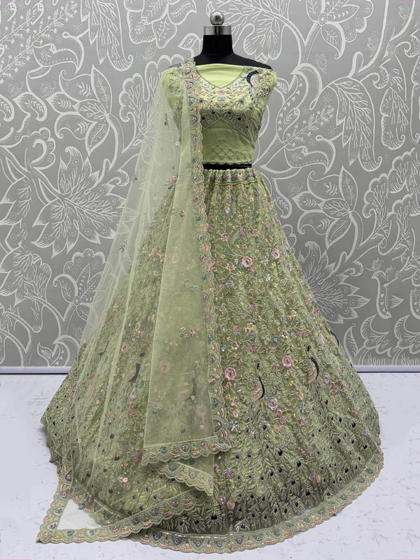 Pretty Green Zircon Work Net Sangeet Wear Lehenga Choli With Dupatta