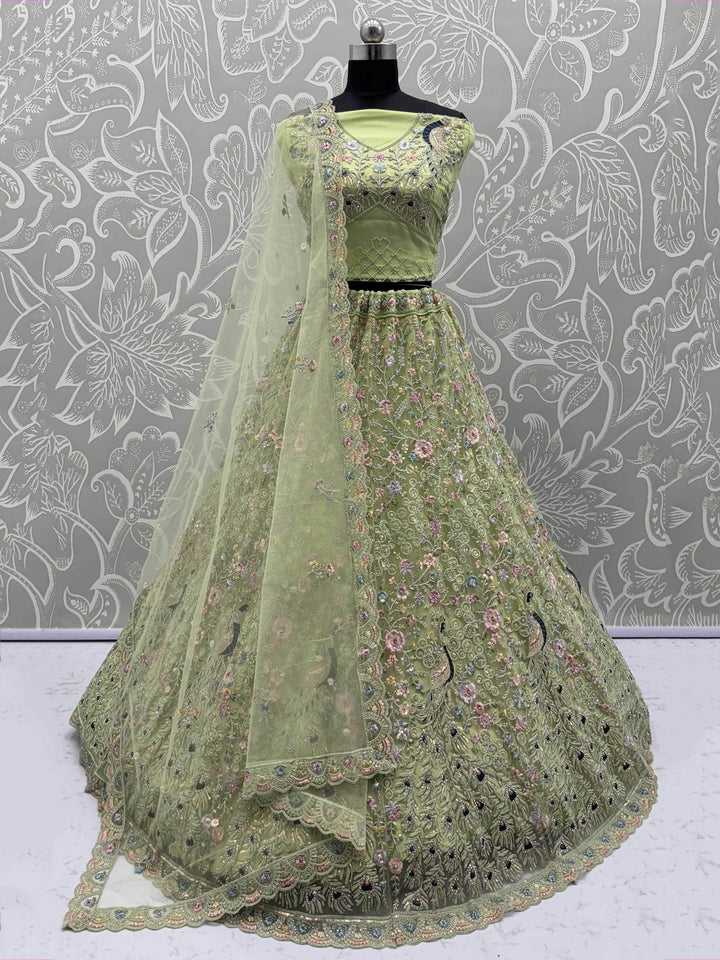 Pretty Green Zircon Work Net Sangeet Wear Lehenga Choli With Dupatta