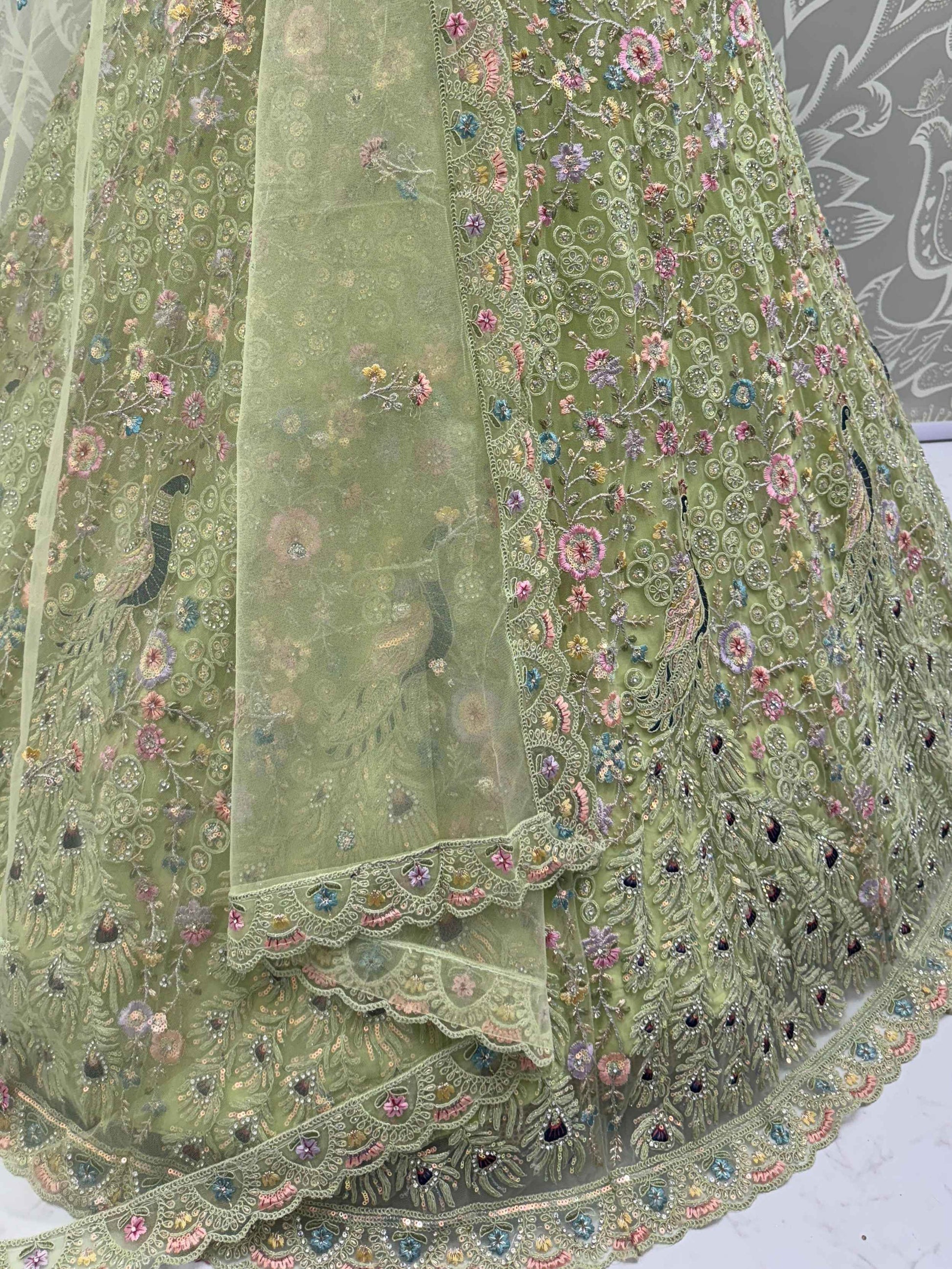Pretty Green Zircon Work Net Sangeet Wear Lehenga Choli With Dupatta
