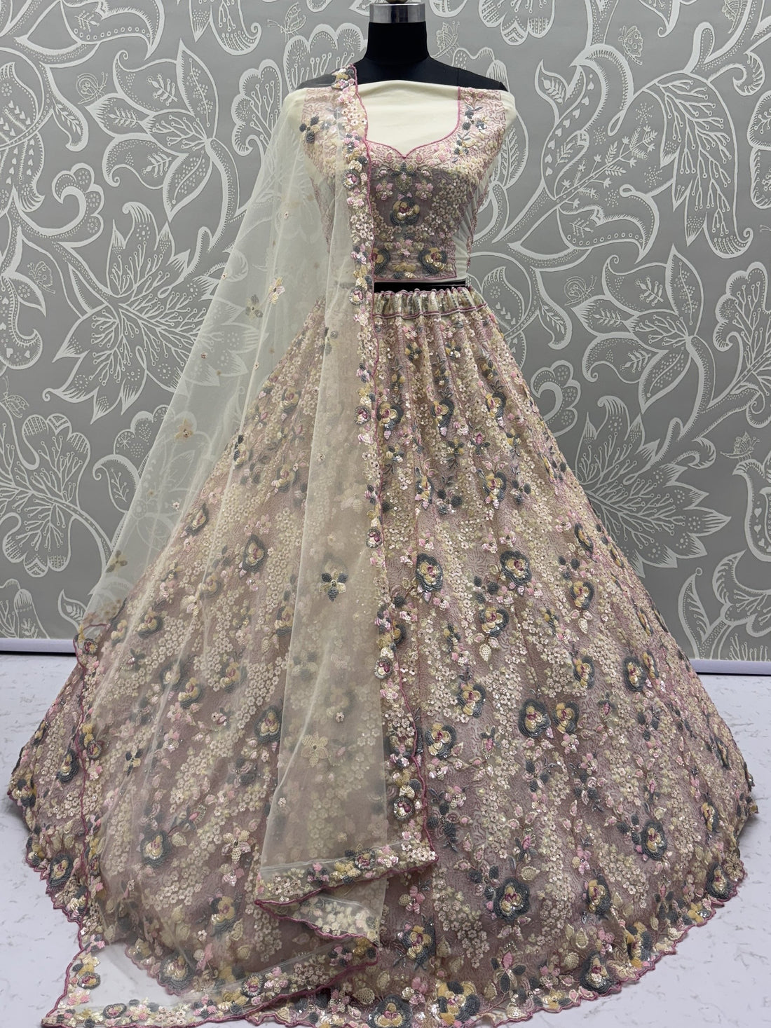 Appealing Yellow Floral Embroidered Net Wedding Wear Lehenga Choli With Dupatta