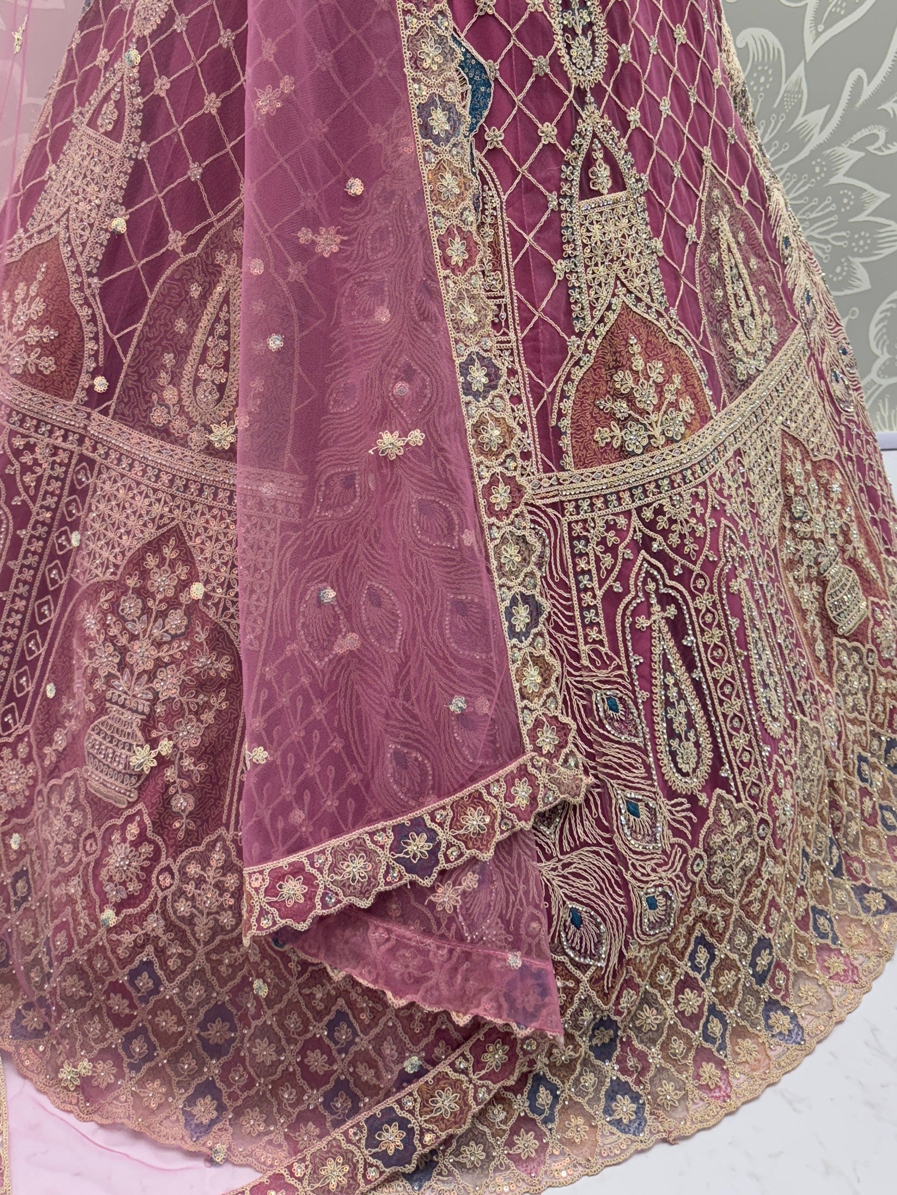 Lovable Pink Multi Thread Work Net Reception Wear Lehenga Choli With Dupatta
