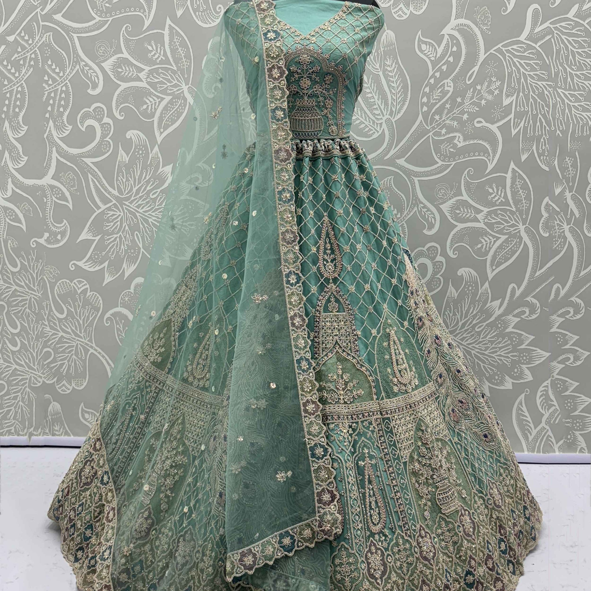 Pretty Sea Green Embroidered Net Function Wear Lehenga Choli With Dupatta