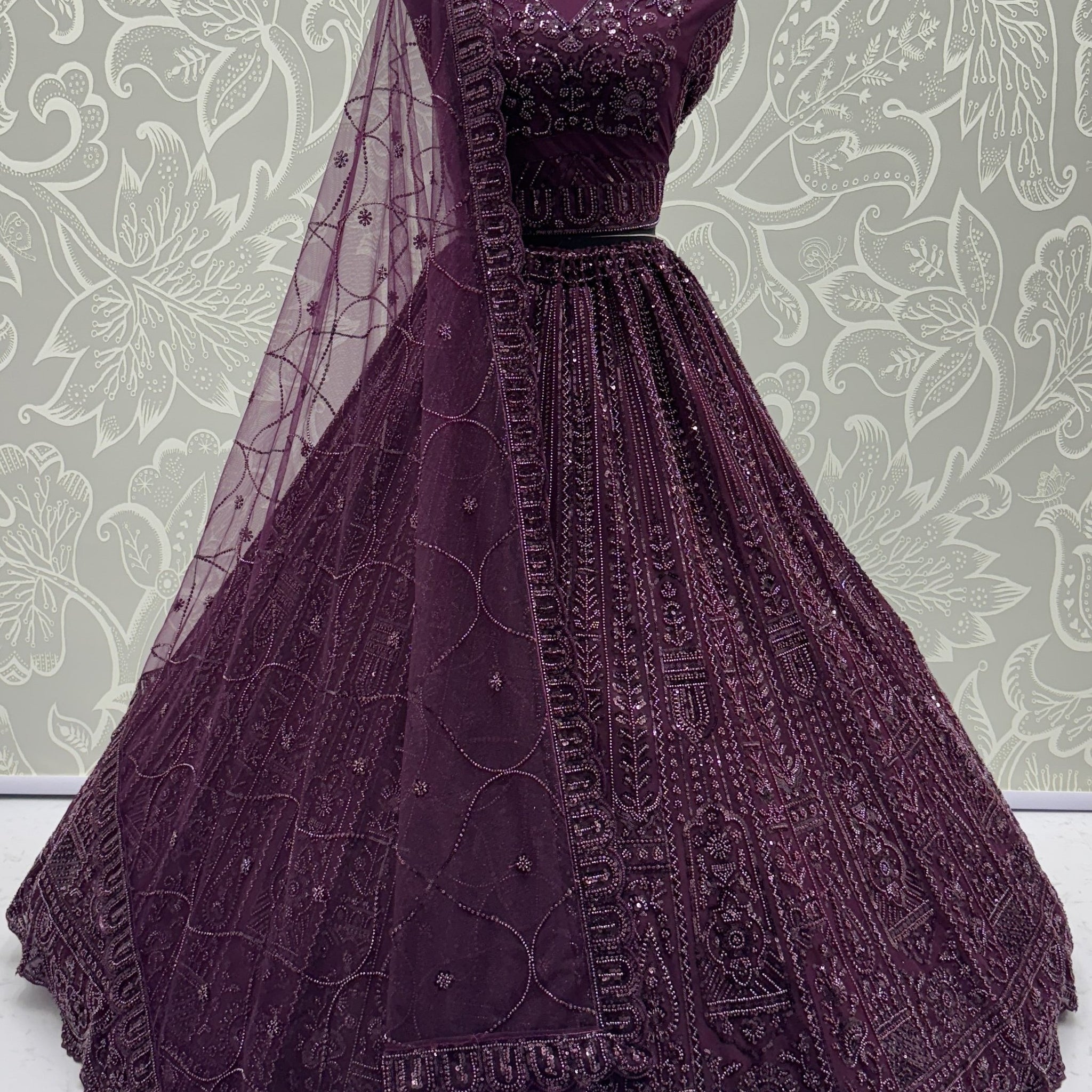 Monochrome Wine Sequins Embroidery Net Sangeet Wear Lehenga Choli