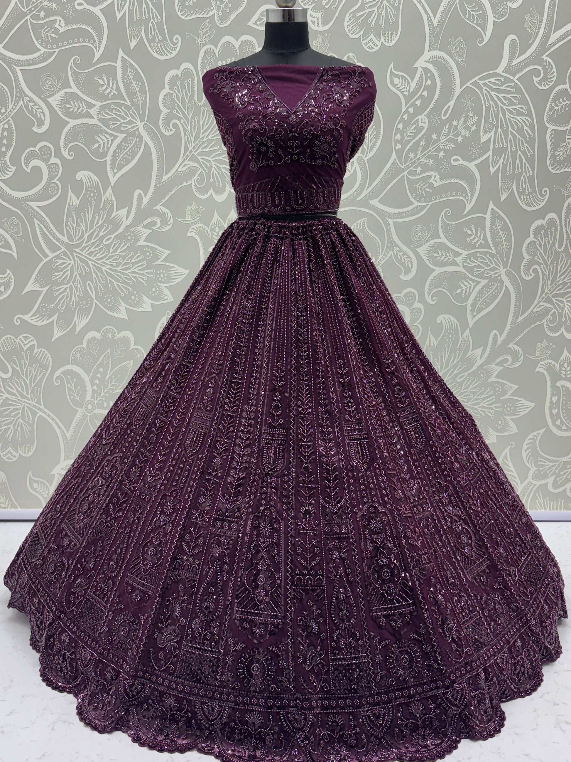 Monochrome Wine Sequins Embroidery Net Sangeet Wear Lehenga Choli