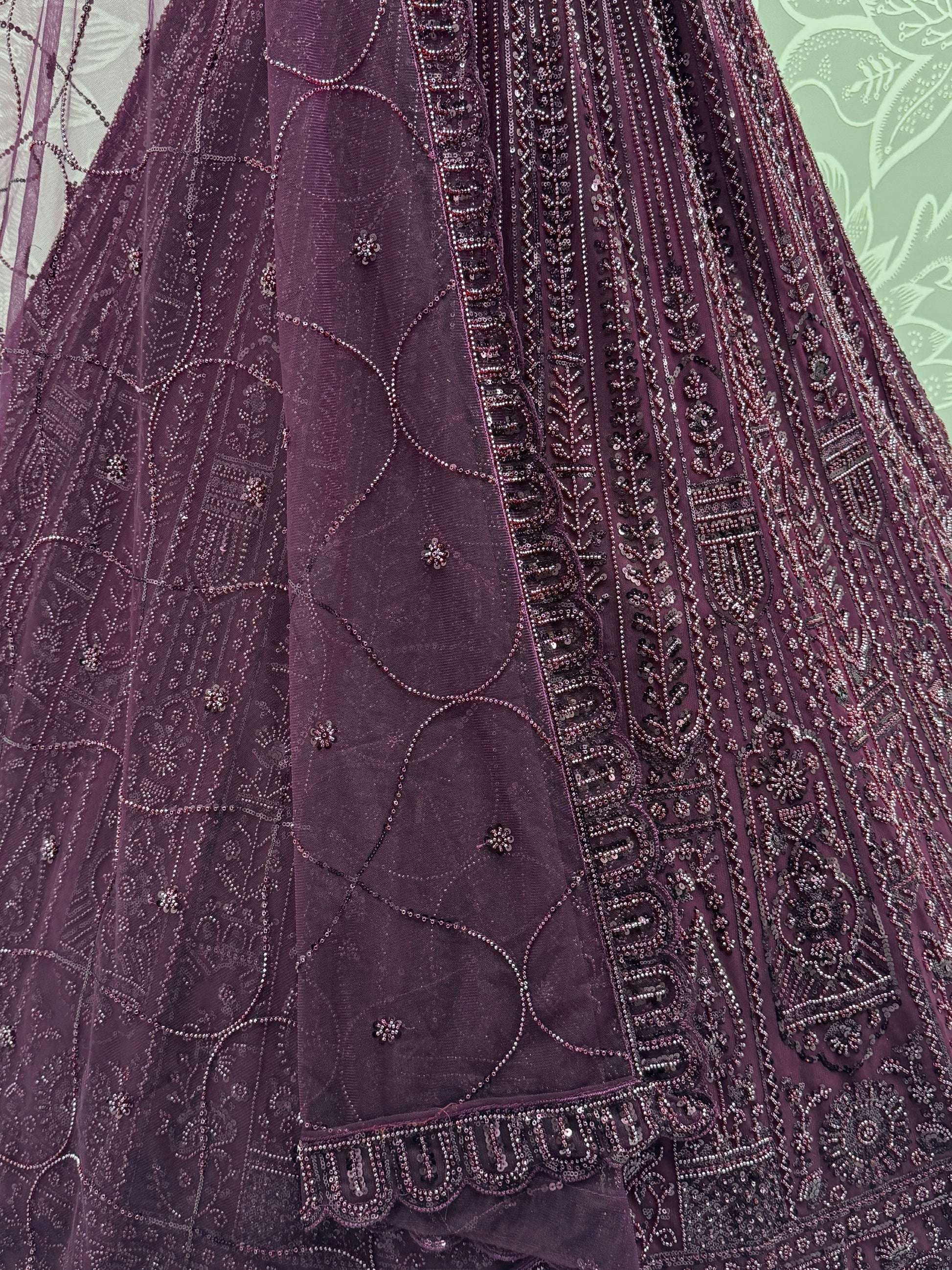 Monochrome Wine Sequins Embroidery Net Sangeet Wear Lehenga Choli