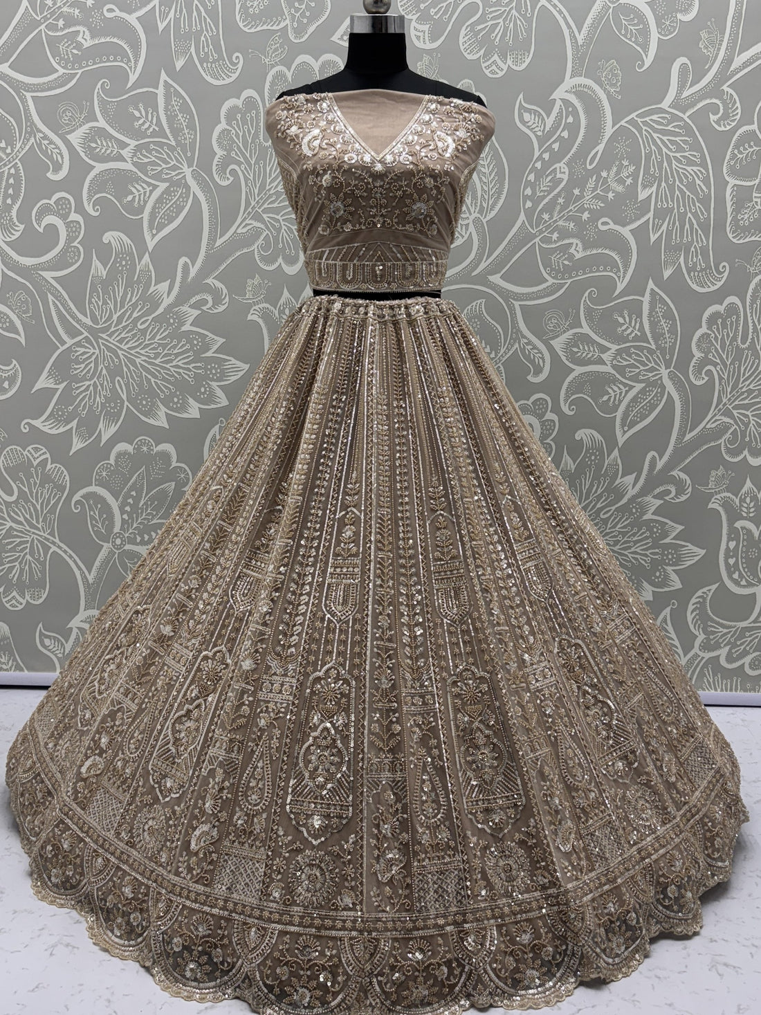Enchanting Beige Embroidered Net Wedding Wear Lehenga Choli With Dupatta