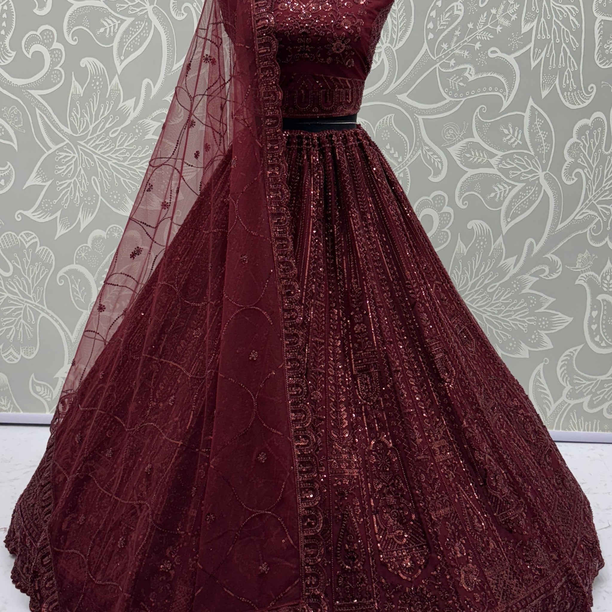 Stellar Maroon Thread Work Net Bridal Lehenga Choli With Dupatta