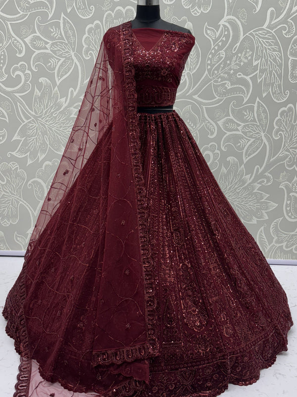 Stellar Maroon Thread Work Net Bridal Lehenga Choli With Dupatta