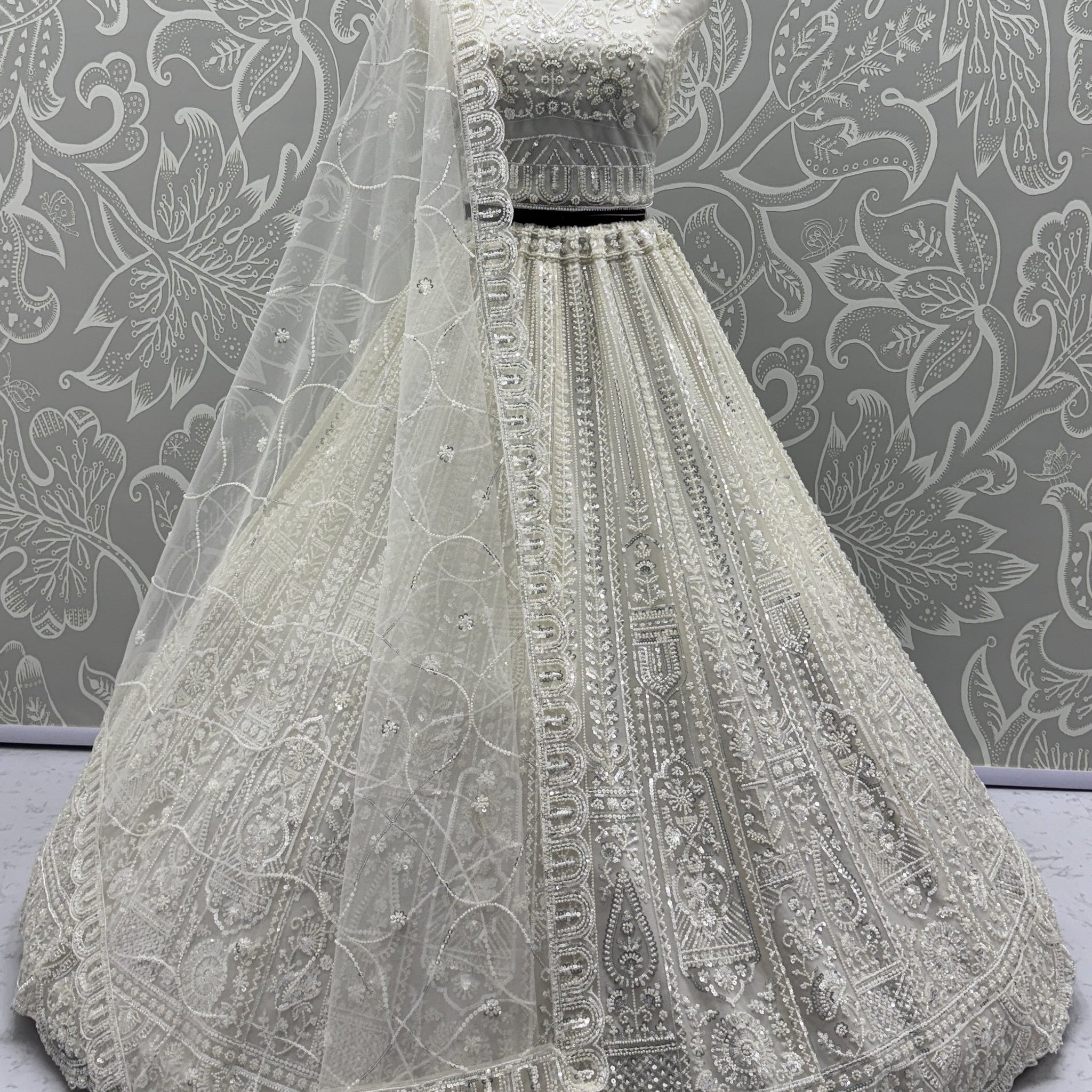 Gorgeous White Moti Work Net Engagement Wear Lehenga Choli With Dupatta
