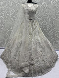 Stunning White Zari Embroidered Net Sangeet Wear Lehenga Choli With Dupatta