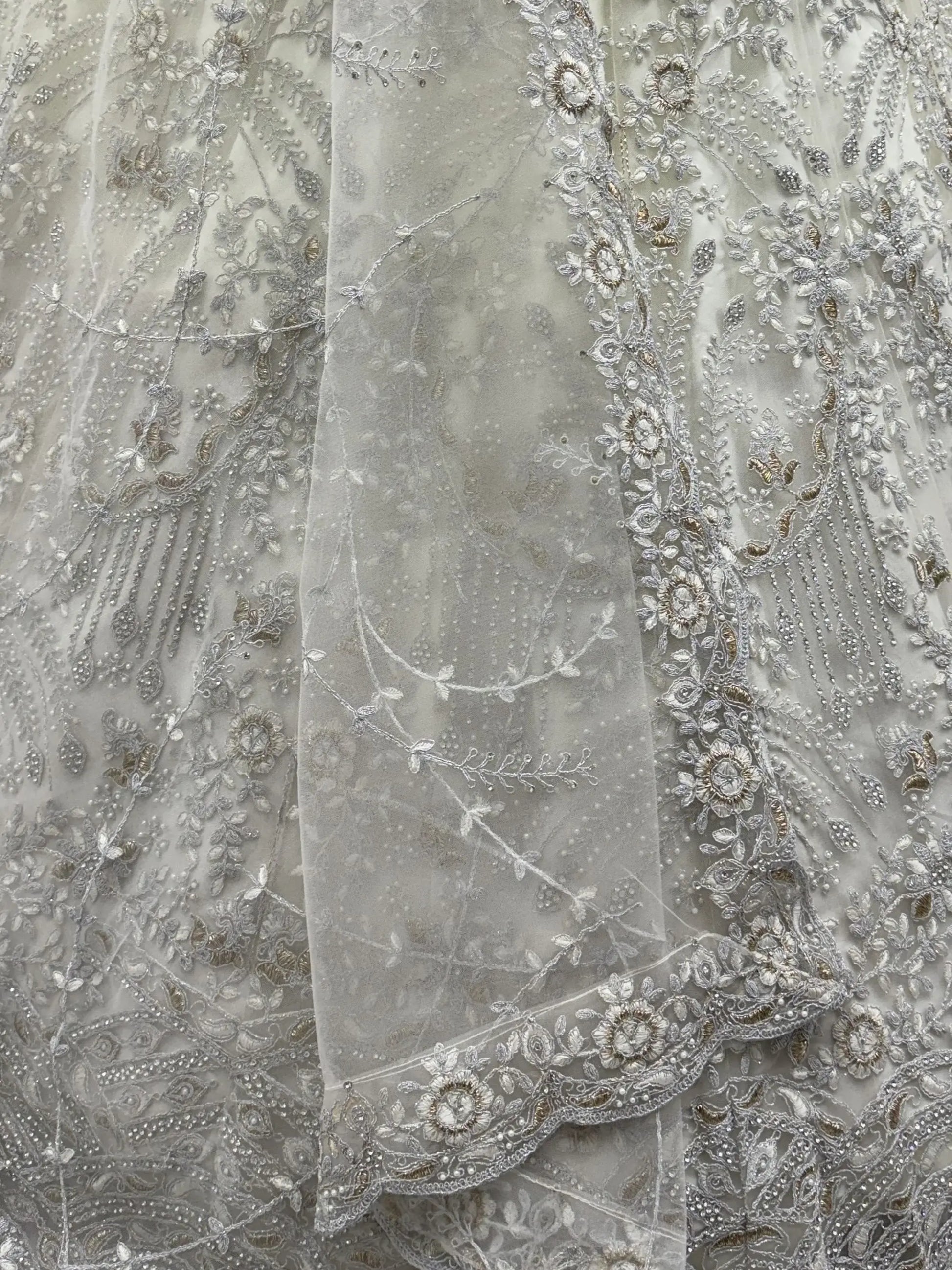 Stunning White Zari Embroidered Net Sangeet Wear Lehenga Choli With Dupatta