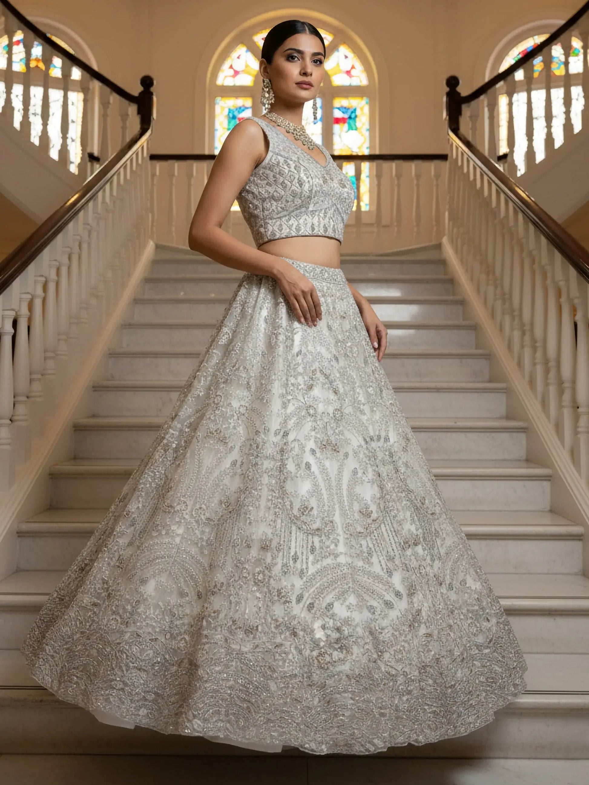 Stunning White Zari Embroidered Net Sangeet Wear Lehenga Choli With Dupatta