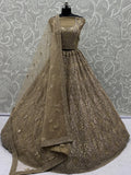 Tremendous Golden Dori Embroidered Net Cocktail Wear Lehenga Choli With Dupatta