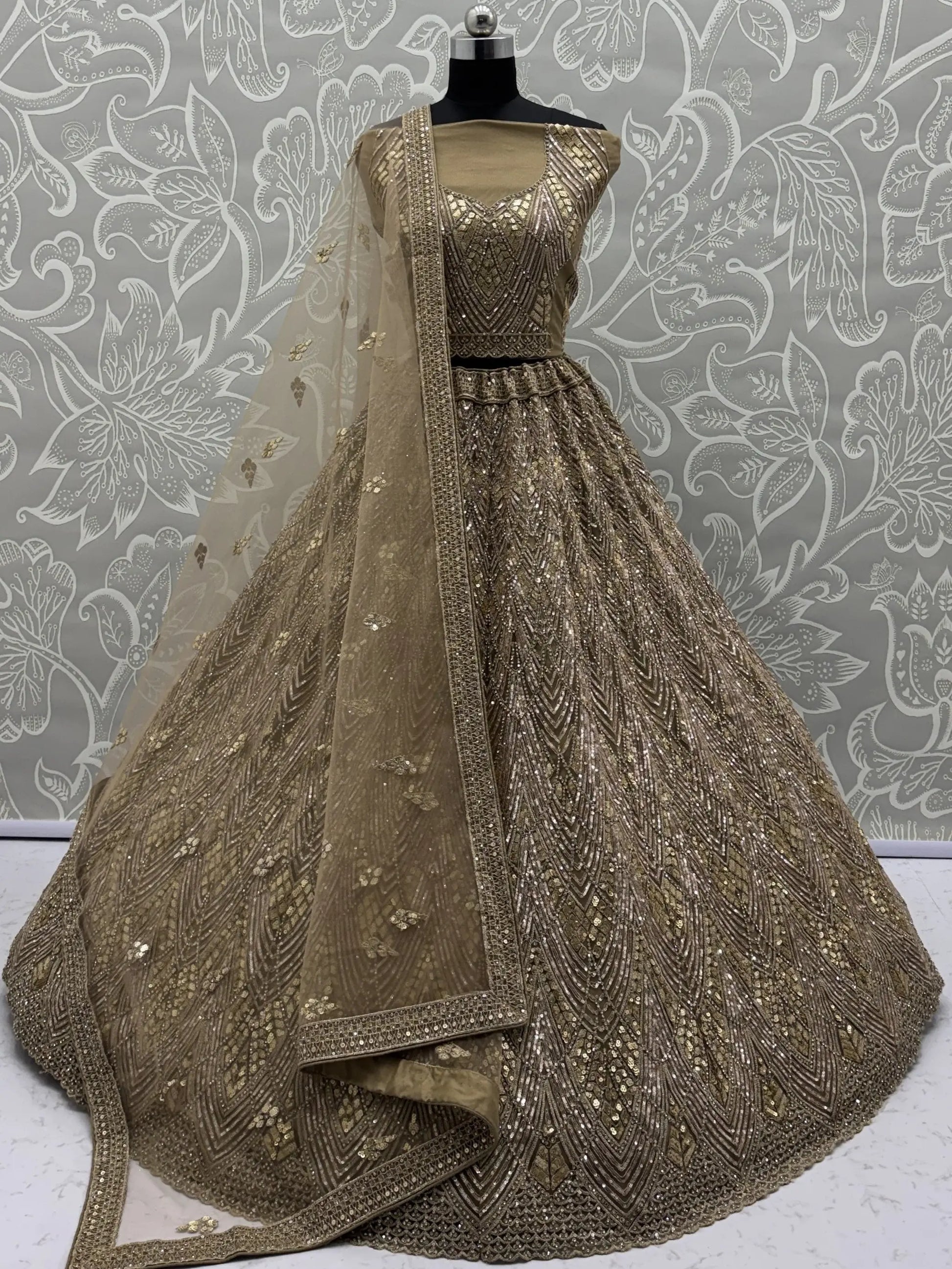 Tremendous Golden Dori Embroidered Net Cocktail Wear Lehenga Choli With Dupatta