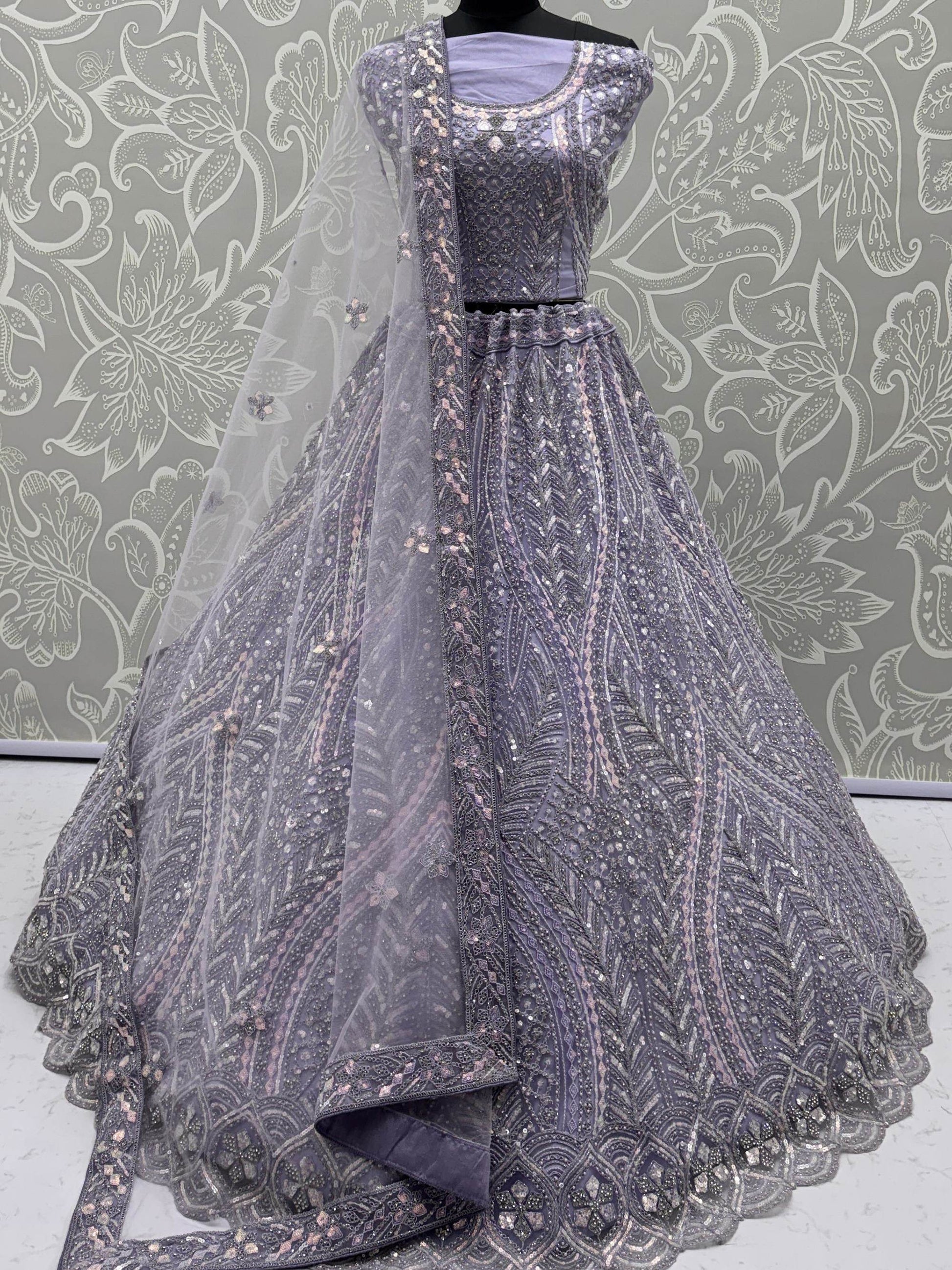 Breathtaking Lavender Thread Work Net Reception Wear Lehenga With Blouse
