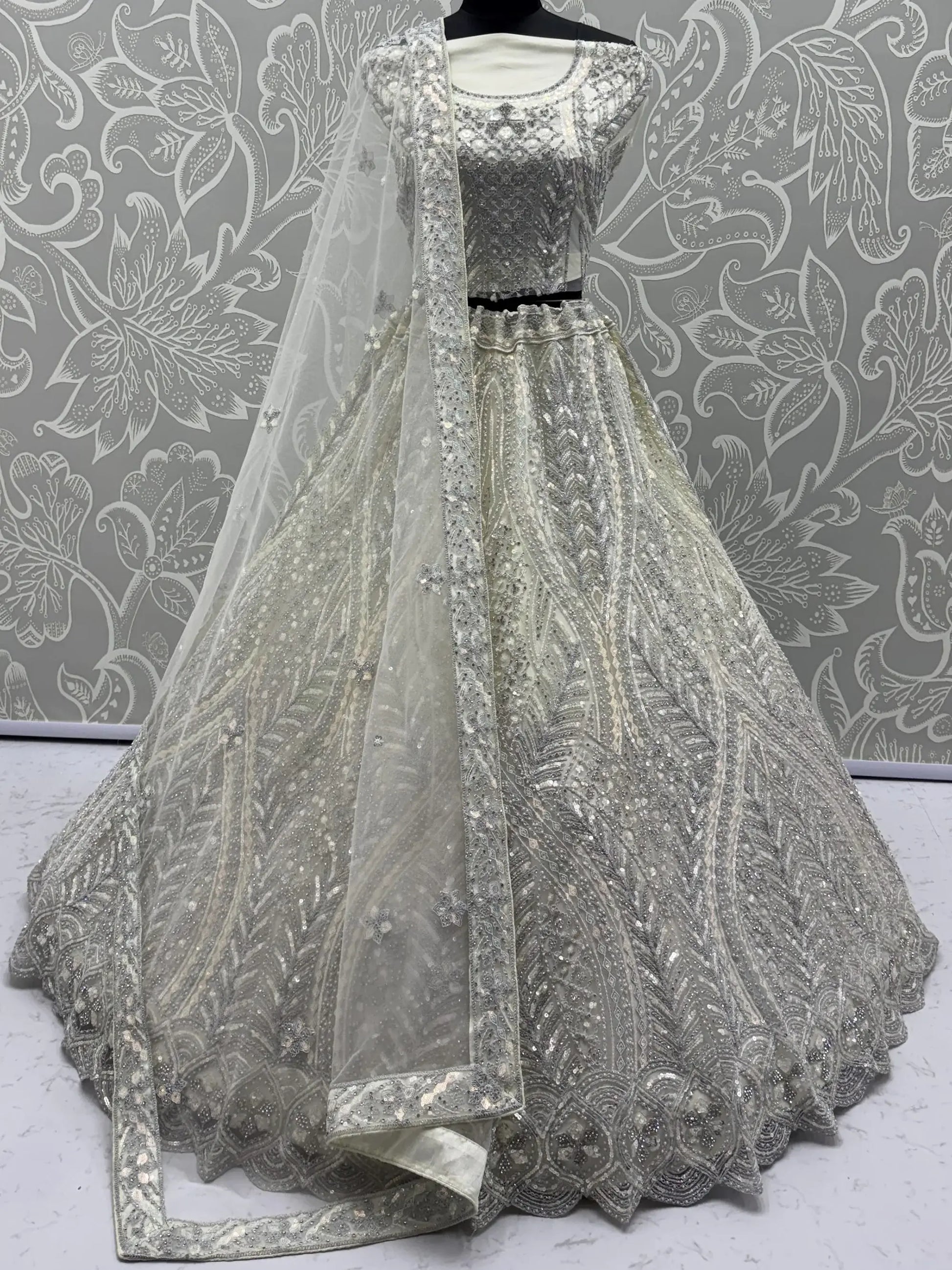 Notable White Embroidered Net Function Wear Lehenga Choli With Dupatta