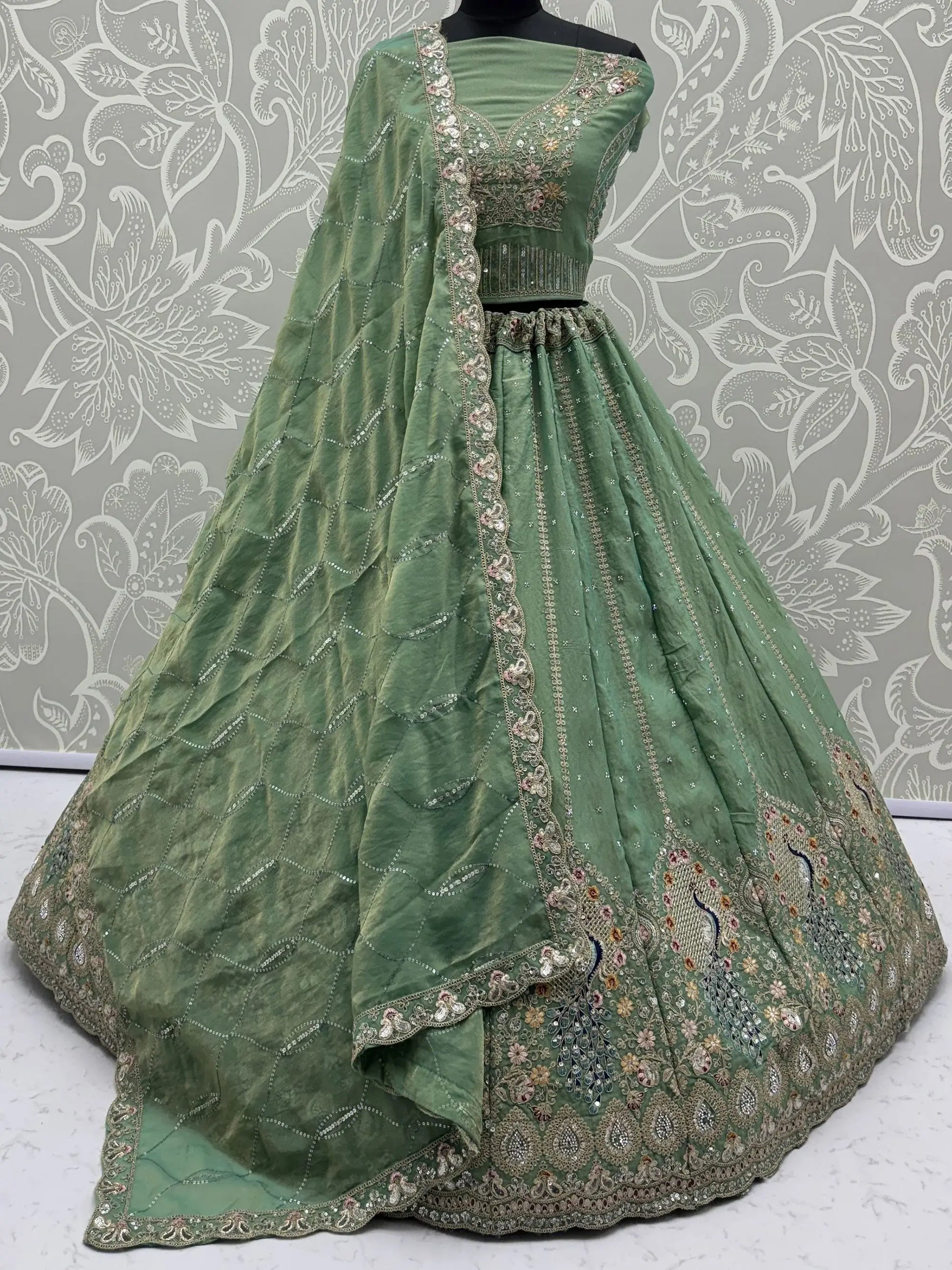 Regal Green Zircon Work Silk Mehendi Wear Lehenga Choli With Dupatta