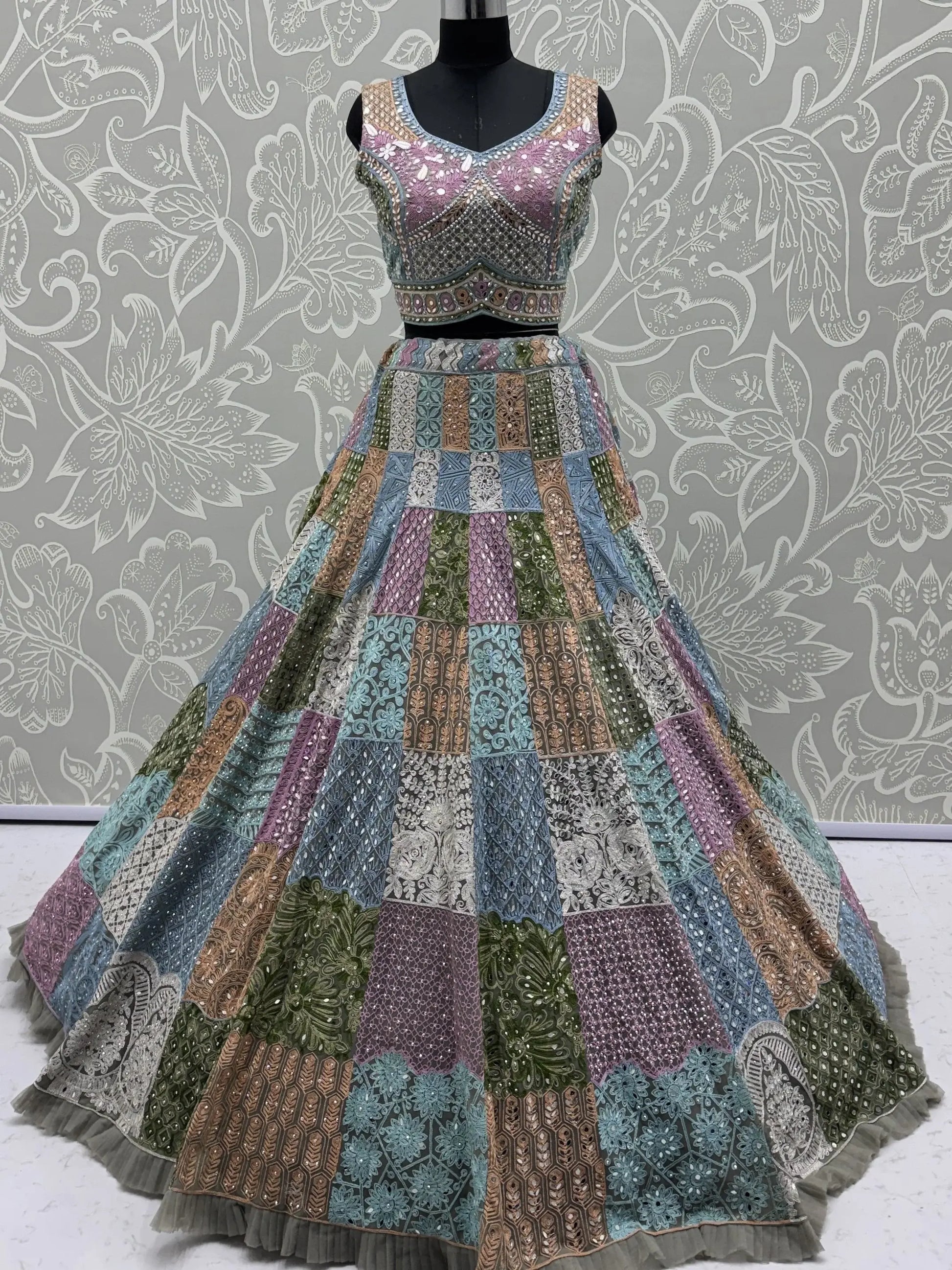 Remarkable Multi-Color Embroidered Net Bridesmaid Lehenga Choli