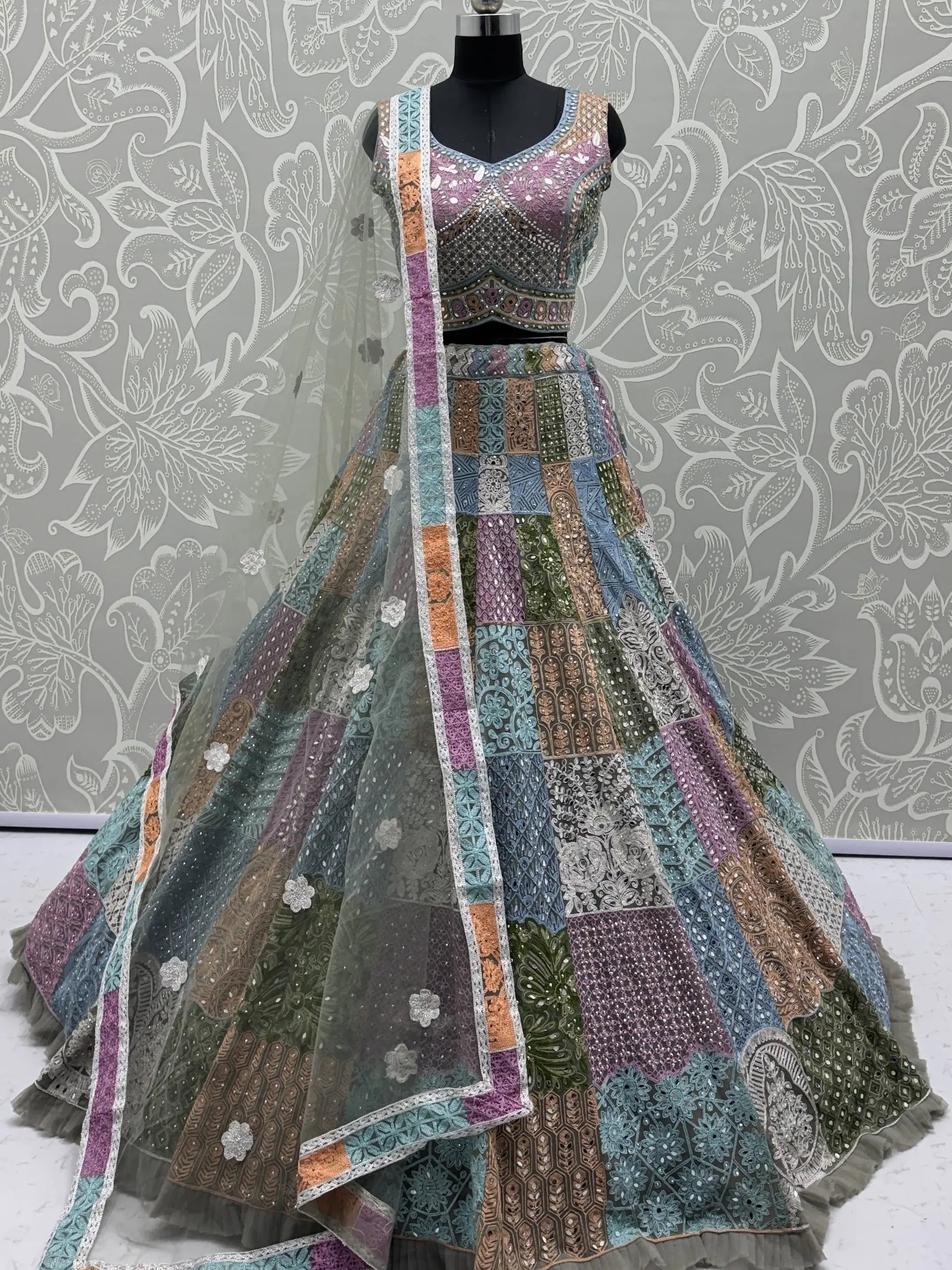 Remarkable Multi-Color Embroidered Net Bridesmaid Lehenga Choli