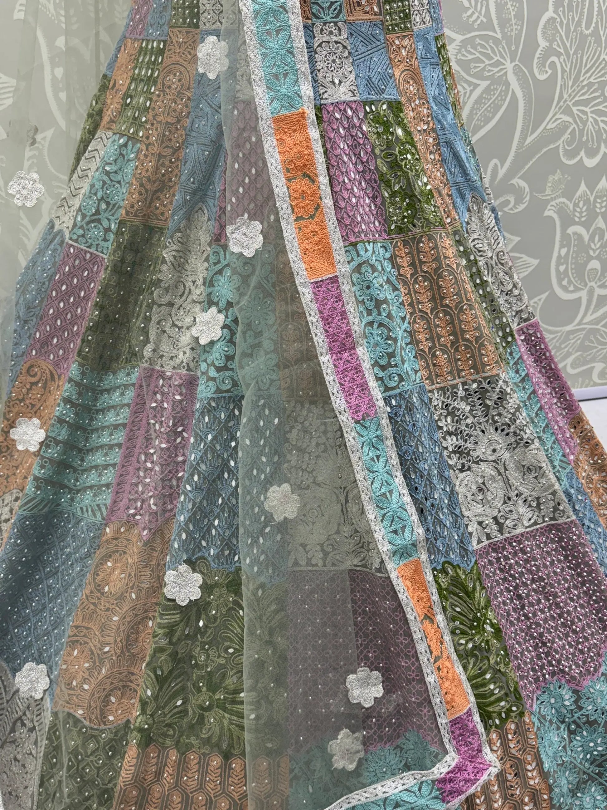 Remarkable Multi-Color Embroidered Net Bridesmaid Lehenga Choli