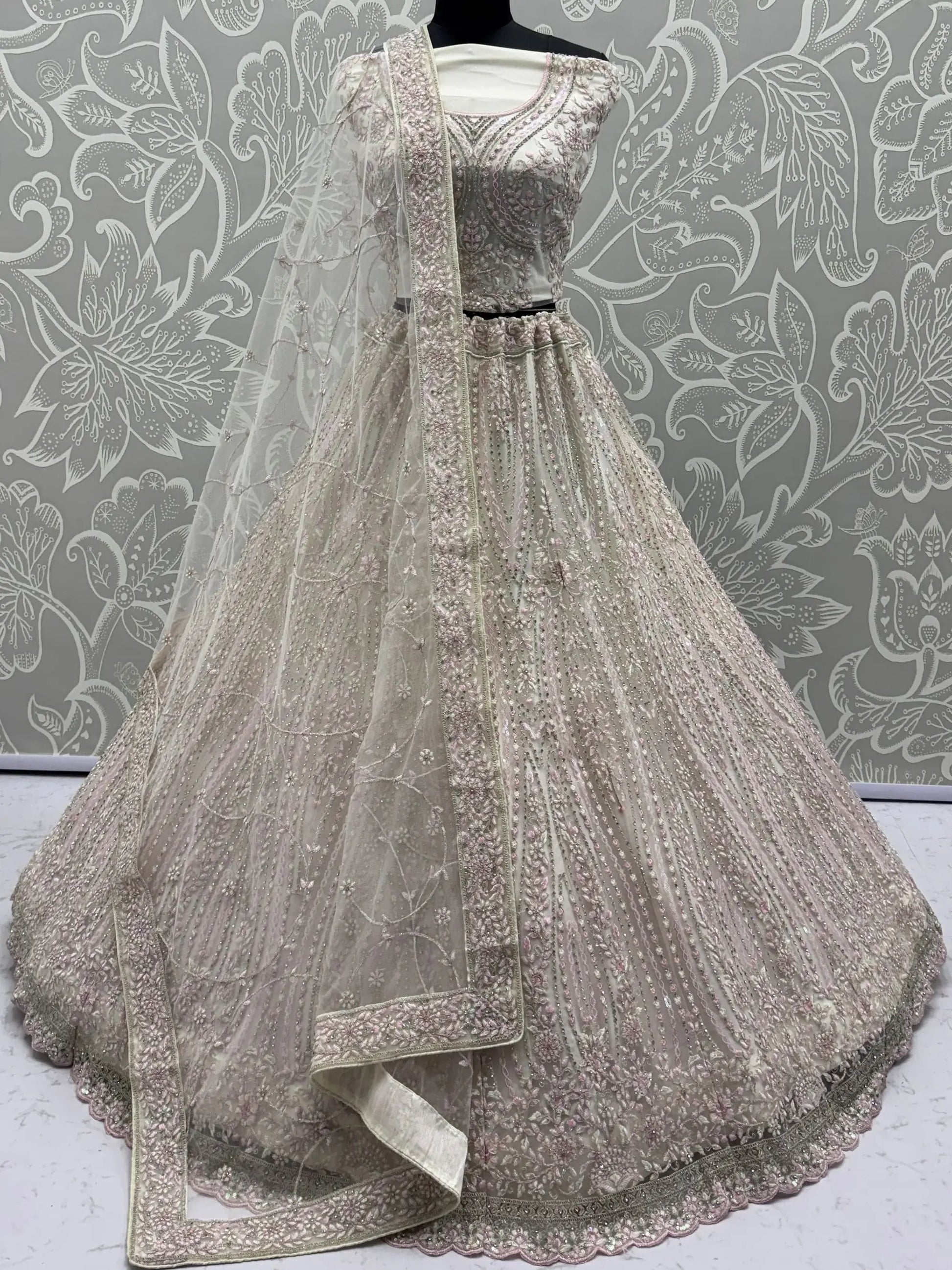 Impressive White Dori Embroidery Net Reception Wear Lehenga Choli