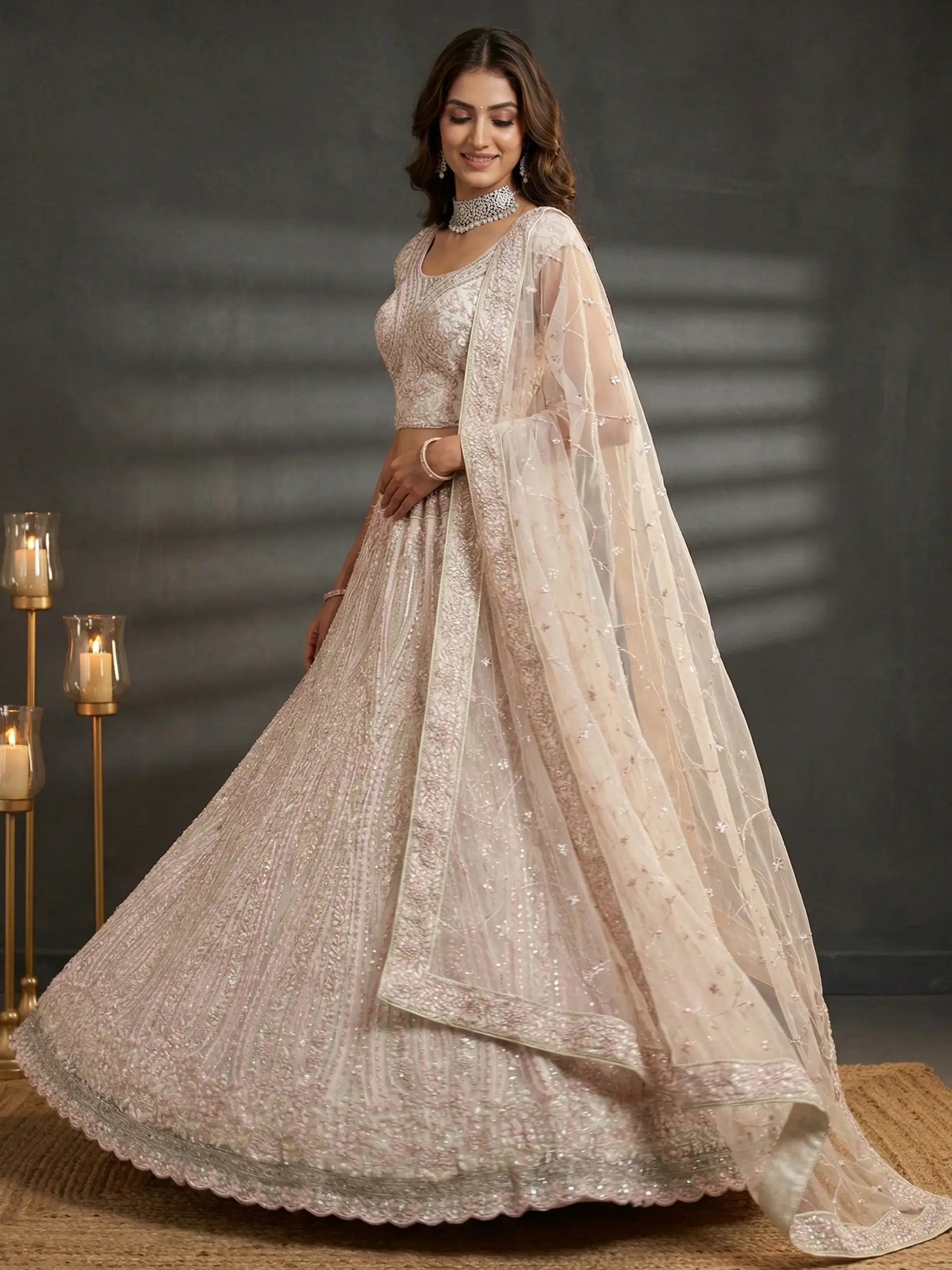 Impressive White Dori Embroidery Net Reception Wear Lehenga Choli