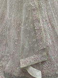 Impressive White Dori Embroidery Net Reception Wear Lehenga Choli