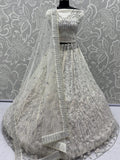 Grand White Dori Embroidery Net Designer Lehenga Choli With Dupatta