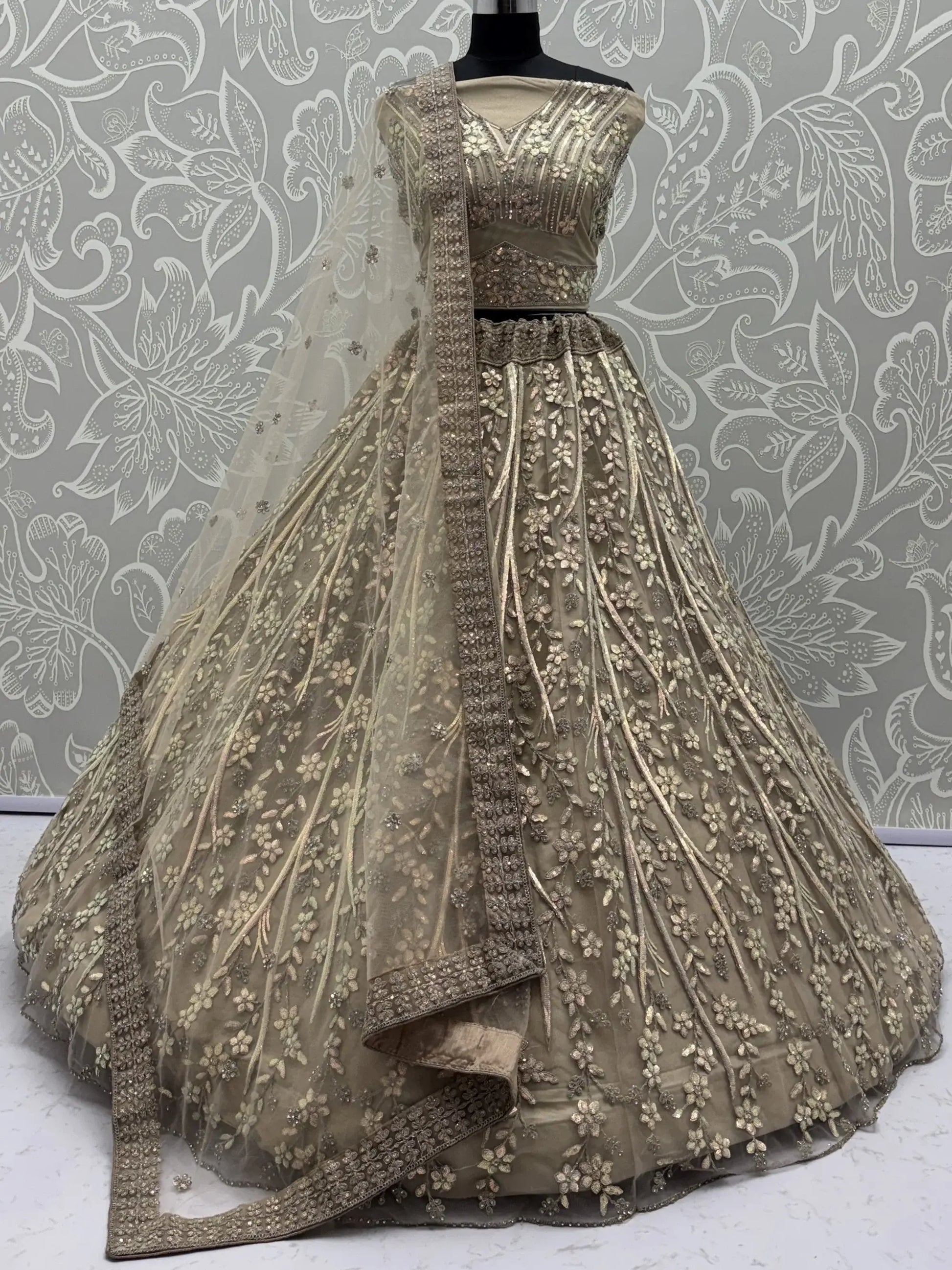 Beautiful Golden Zircon Work Net Sangeet Wear Lehenga Choli With Dupatta