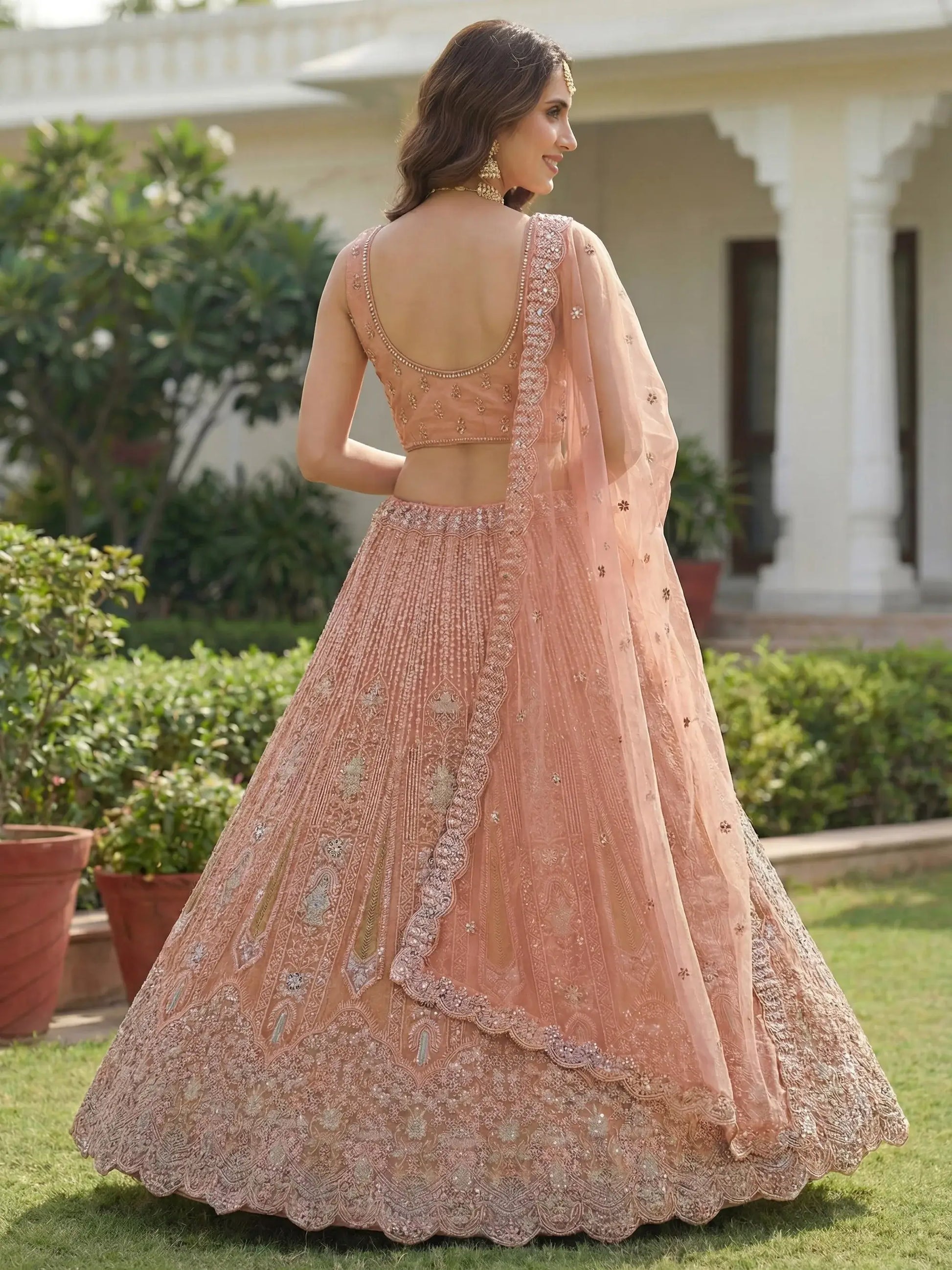 Adorable Peach Zircon Work Net Wedding Wear Lehenga Choli With Dupatta