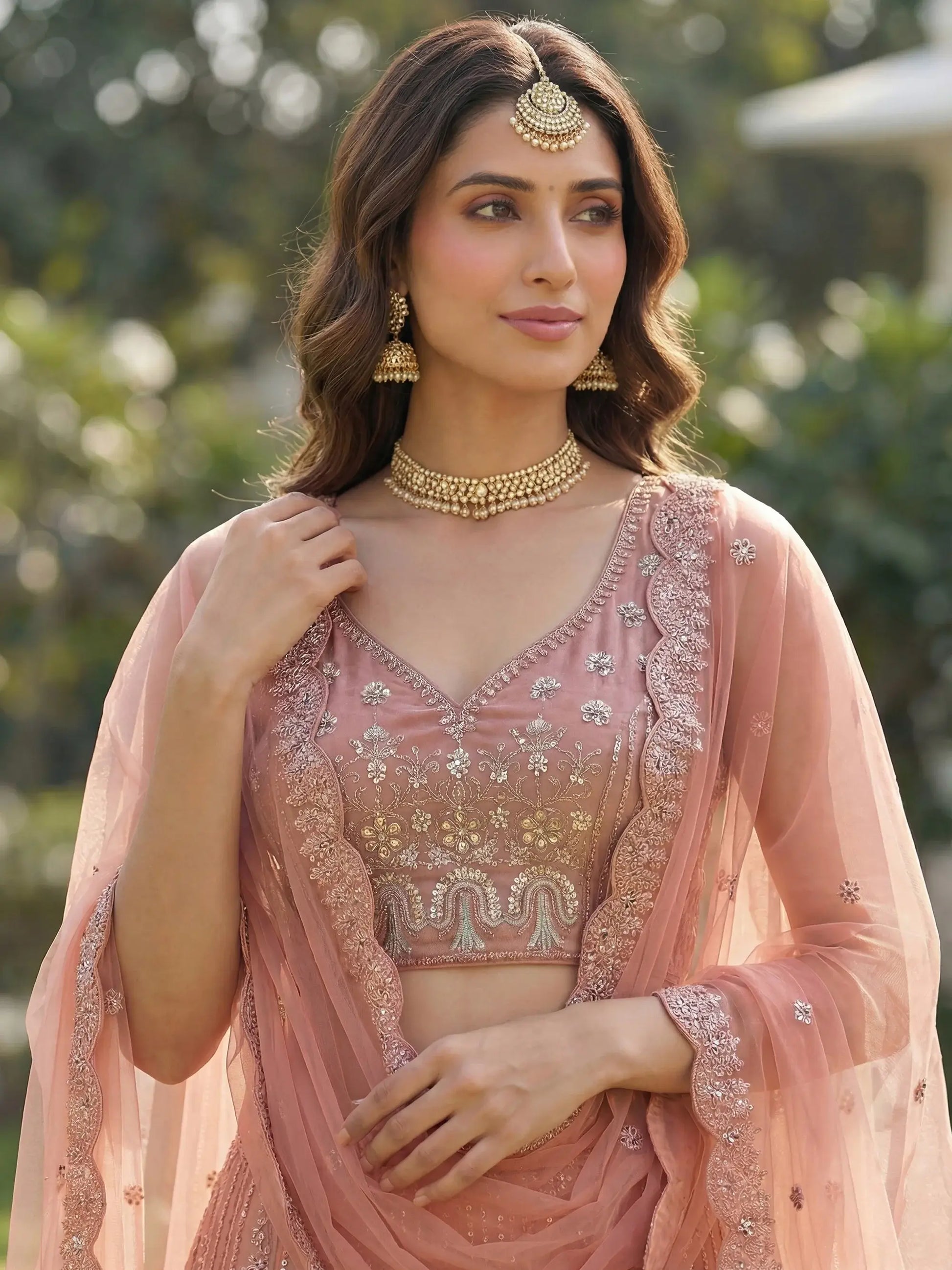 Adorable Peach Zircon Work Net Wedding Wear Lehenga Choli With Dupatta