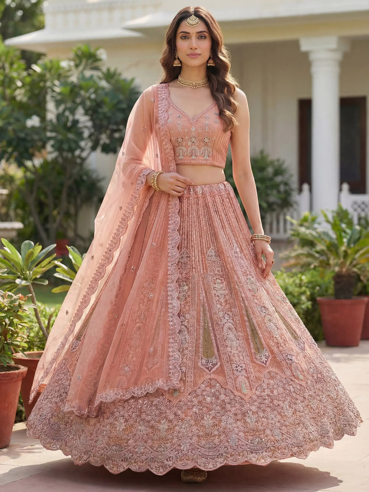 Adorable Peach Zircon Work Net Wedding Wear Lehenga Choli With Dupatta