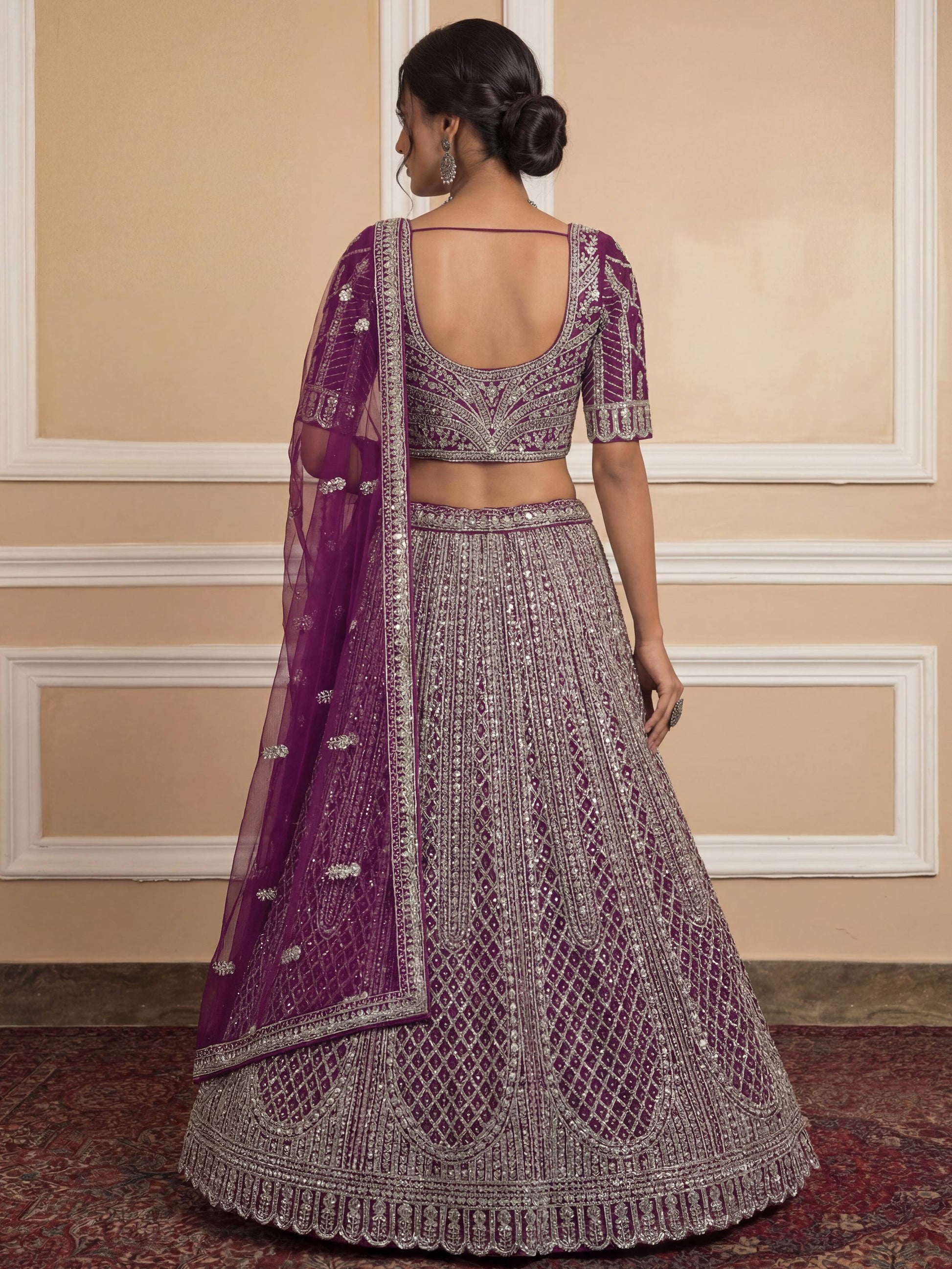 Graceful Purple Thread Embroidery Net Reception Wear Lehenga With Blouse
