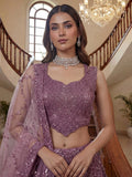 Breathtaking Purple Sequins Net Engagement Wear Lehenga With Blouse