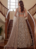 Sparkling Beige Thread Embroidered Net Sangeet Wear Lehenga Choli