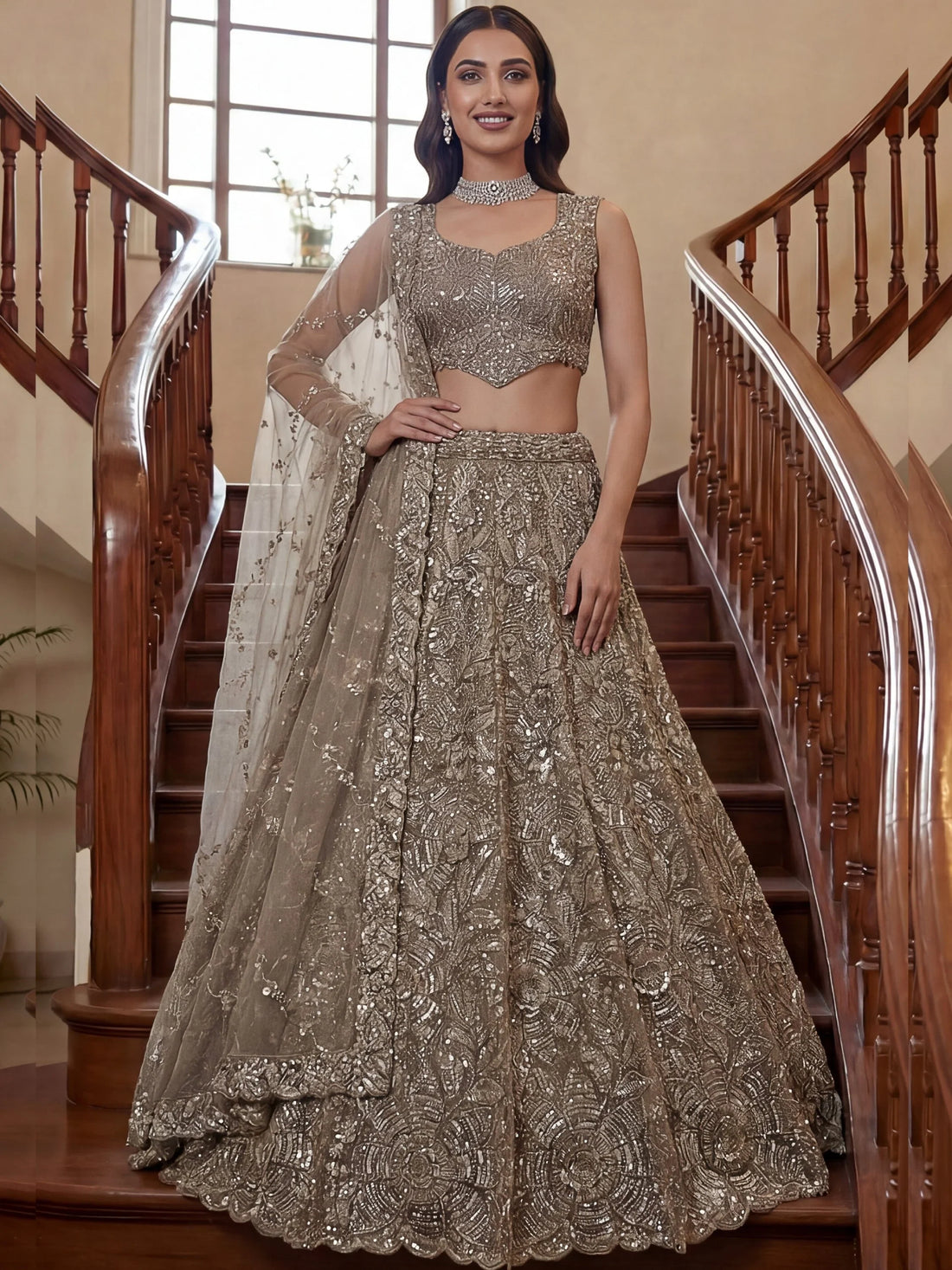 Sparkling Beige Thread Embroidered Net Sangeet Wear Lehenga Choli